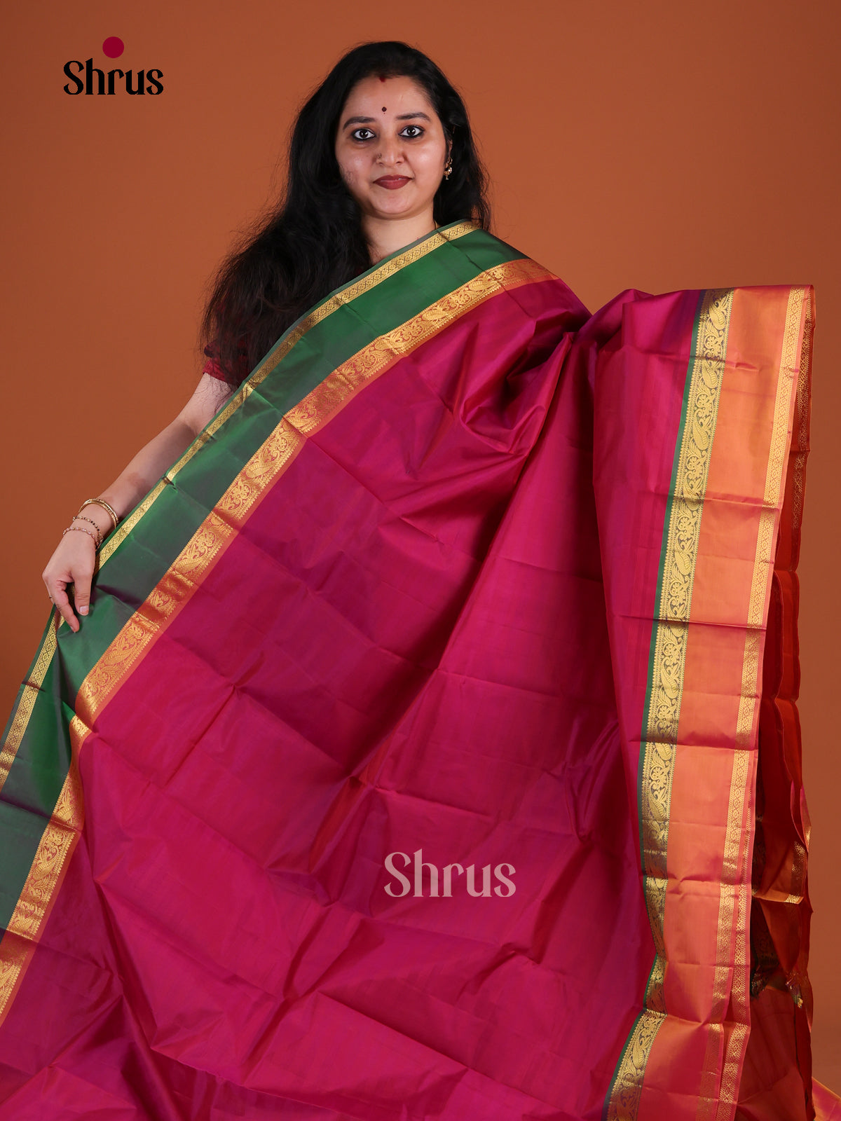 Opulent Dark Pink Kanchipuram Pattu Saree With Plain Body | Orange & Green Ganga Jamuna Rettapet Zari Border