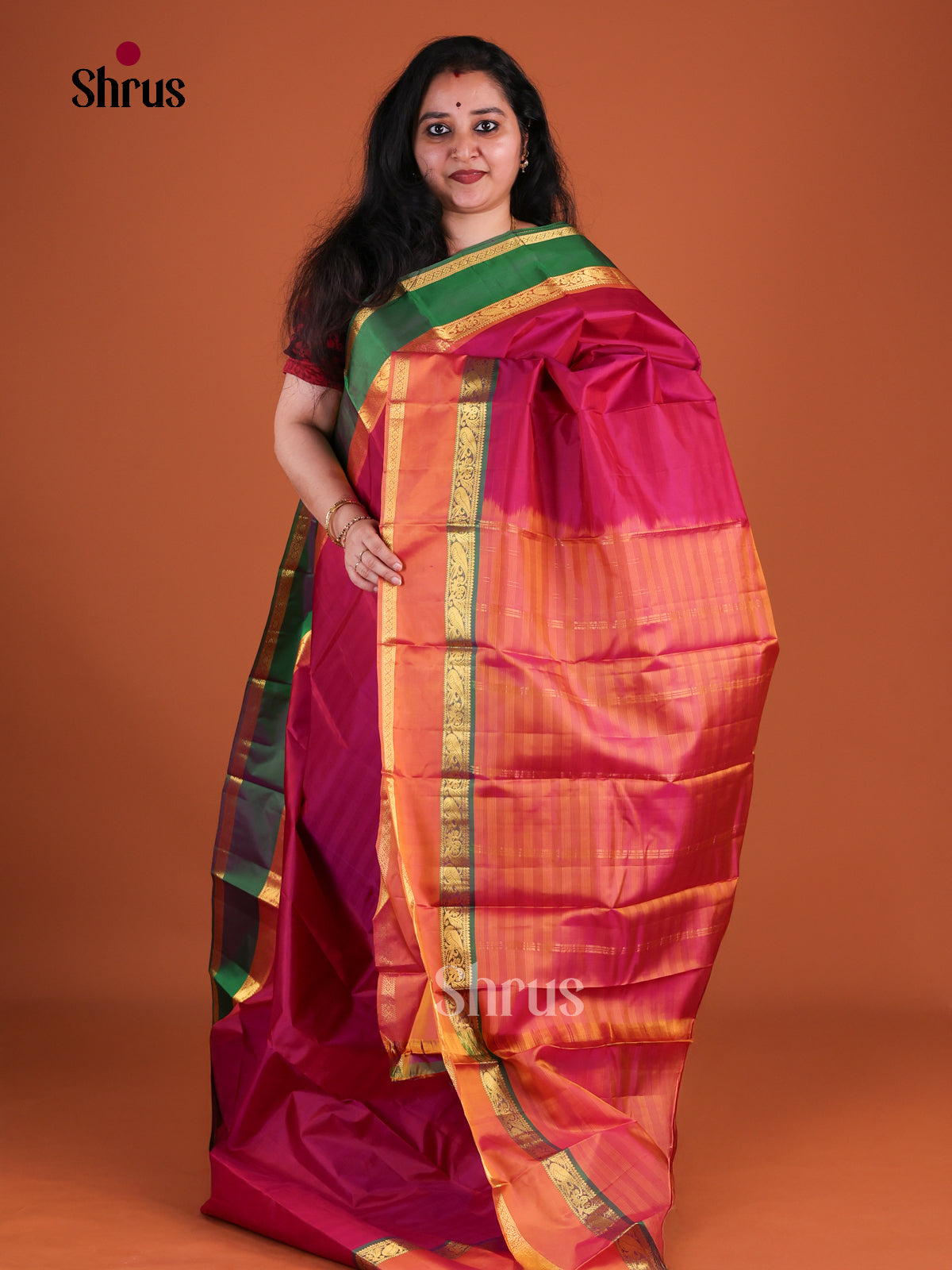 Opulent Dark Pink Kanchipuram Silk Saree With Plain Body | Orange & Green Ganga Jamuna Rettapet Zari Border