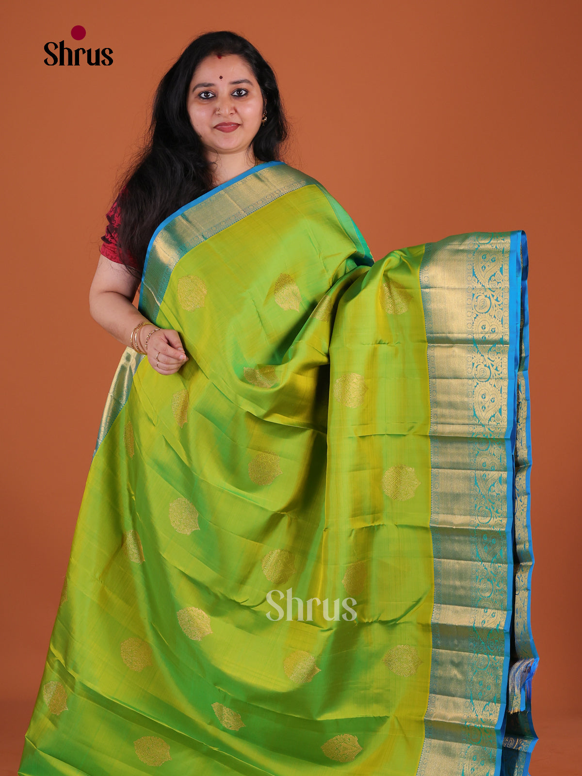 Opulent Parrot Green Kanchipuram Pattu Saree With Paisley Inspired Motifs | Sky Blue Zari Border & Brocade Pallu