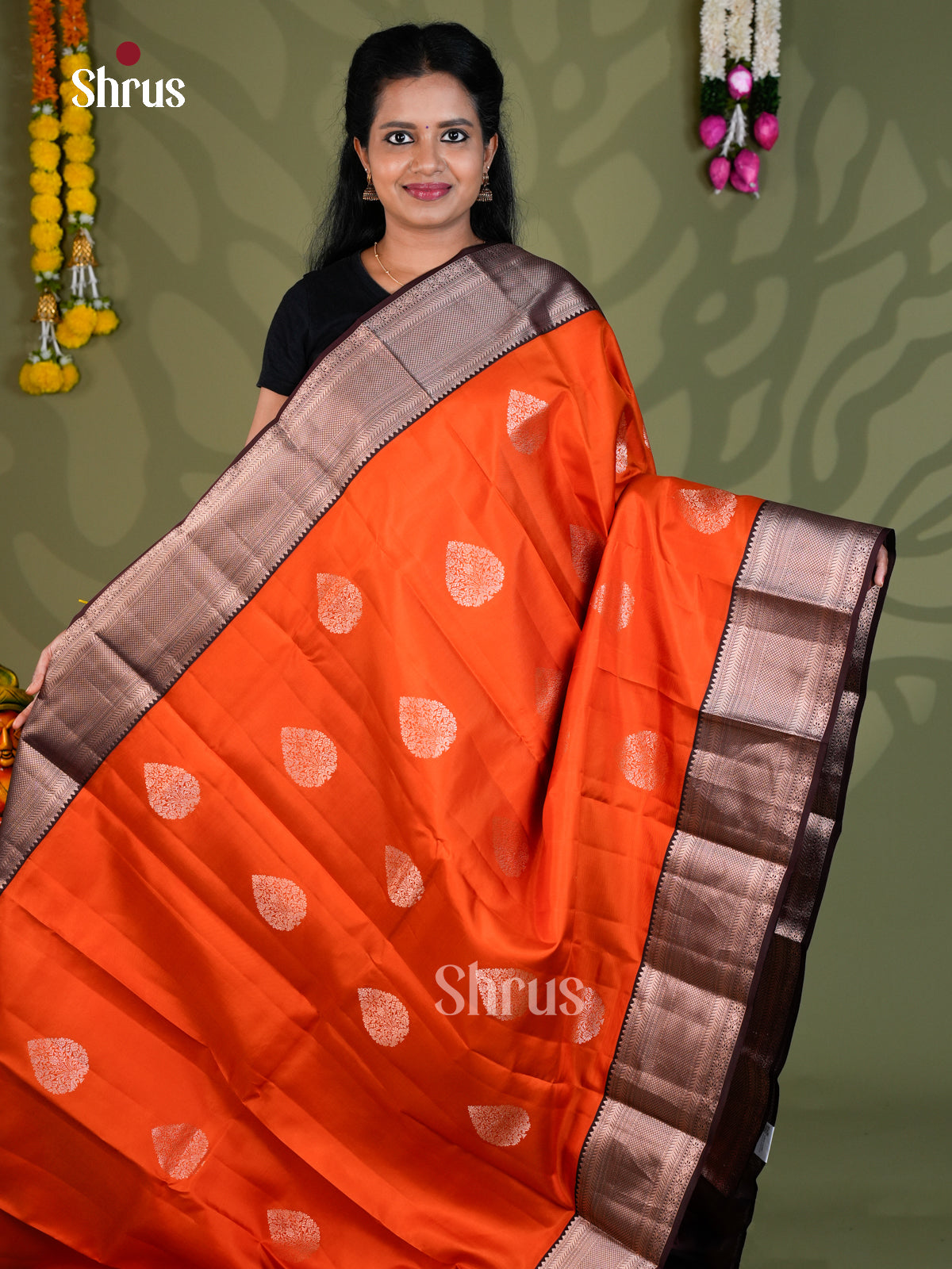 Buy Pretty Orange Kanchipuram Saree with Paisley Floral Drop Motifs, Brown Border & Brocade Pallu