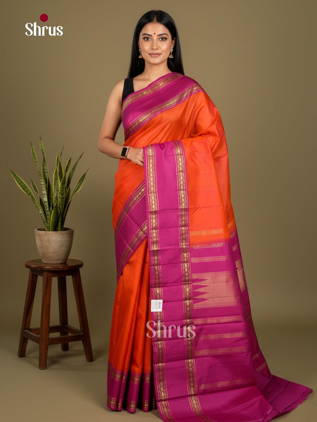 Buy Lustrous Orange Kanchipuram Saree with Plain Body, Purple Rettaipet Border & Zari Woven Pallu