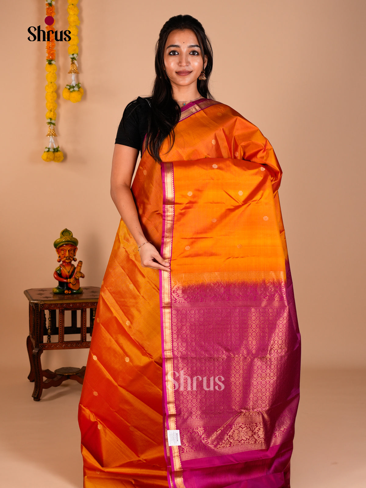 Buy Lustrous Orange Kanchipuram Silk Saree with Gold Buttas, Purple Thin Border & Brocade Pallu