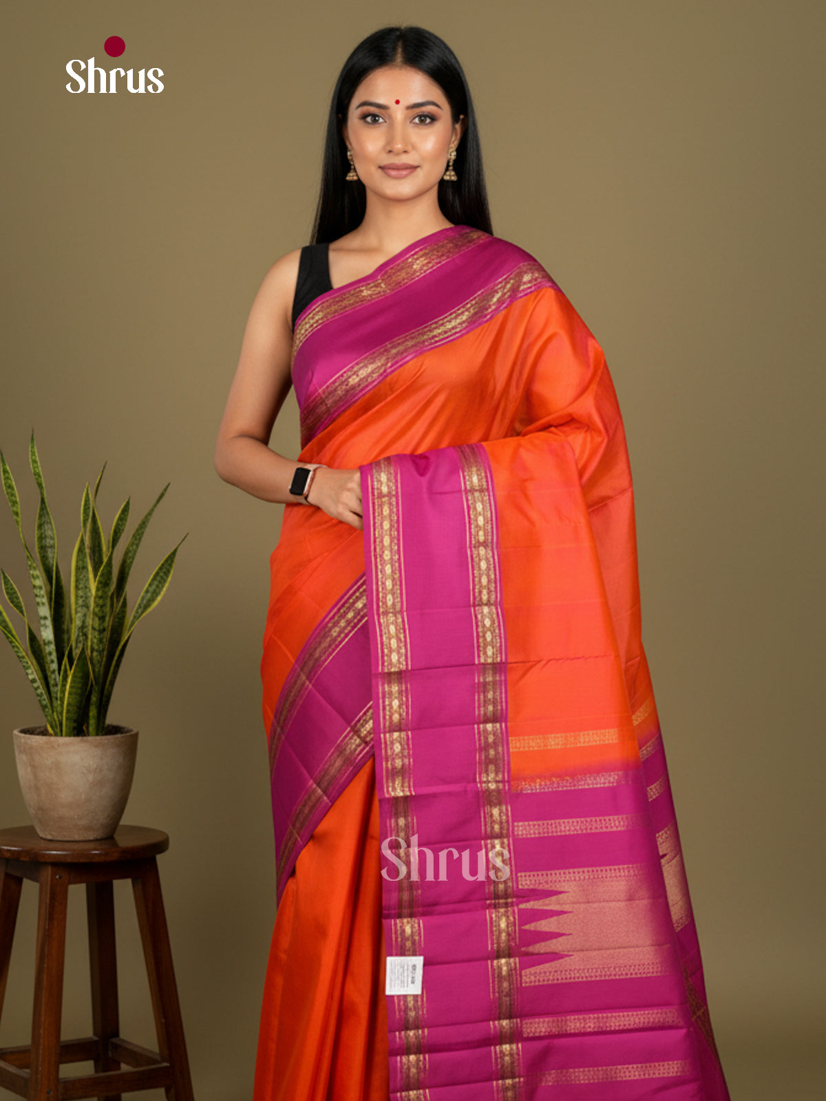Buy Lustrous Orange Kanjivaram Saree with Plain Body, Purple Rettaipet Border & Zari Woven Pallu