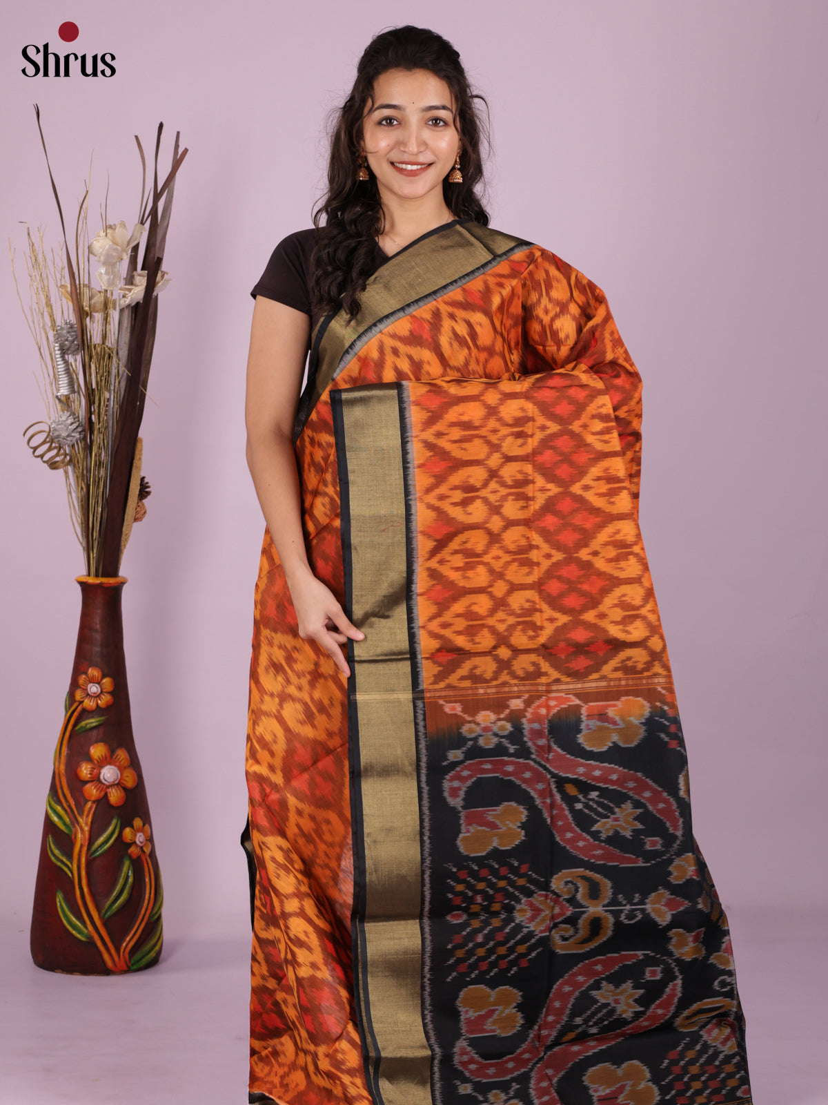 Buy Warm Orange Pochampally Silk Cotton Saree With Diamond Ikat Motifs, Black Border & Pallu