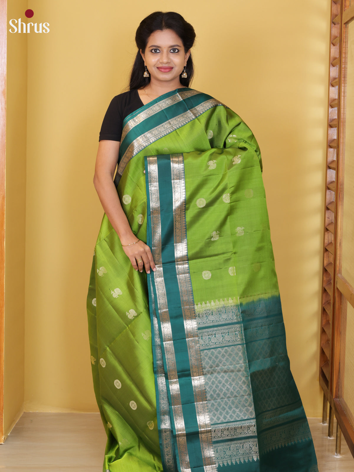 Buy Serene Parrot Green Soft Silk Saree with Silver Zari Buttas & Teal Rettaipet Border & Pallu