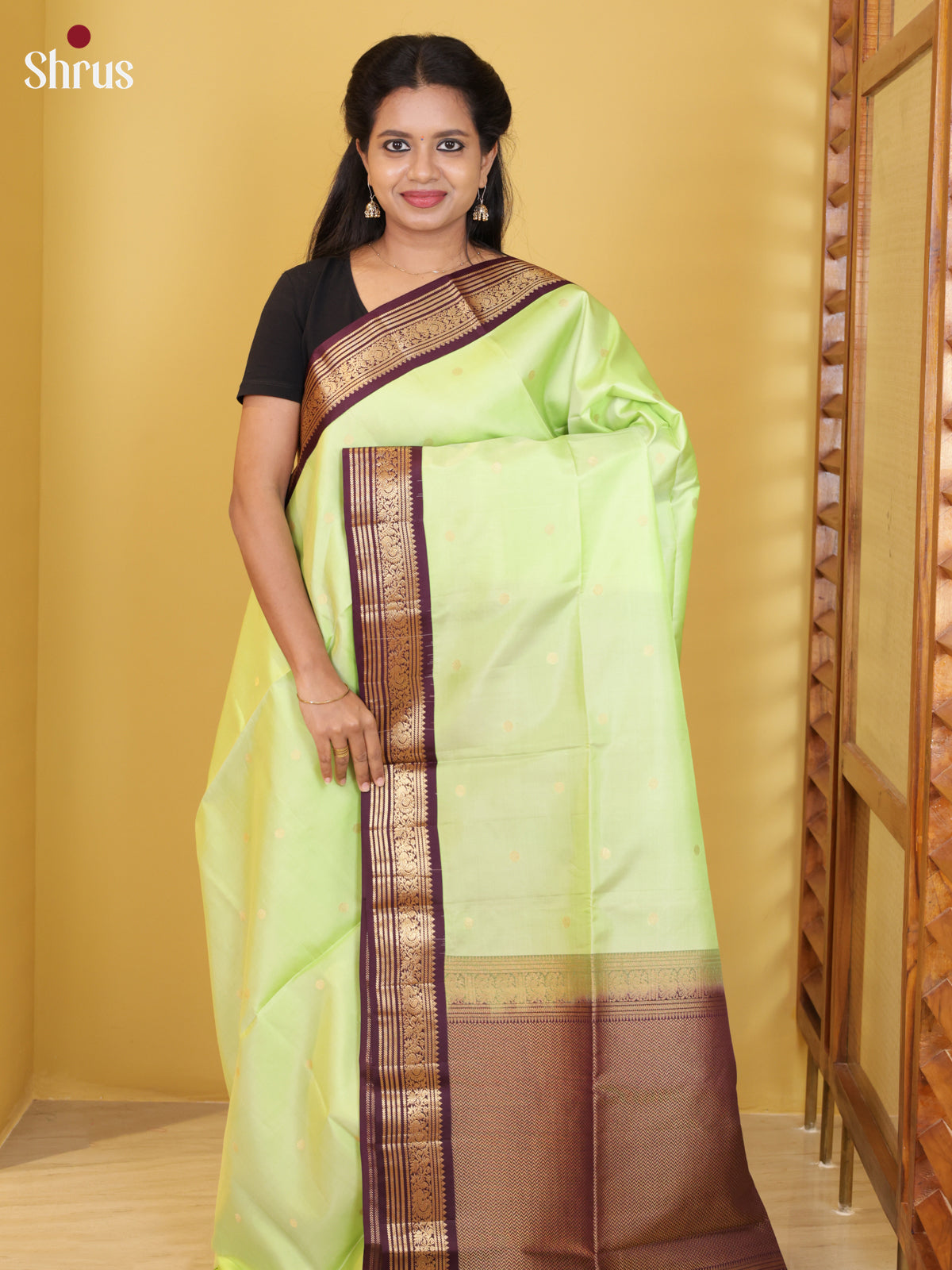Buy Timeless Pastel Green Soft Silk Saree with Golden Buttas, Purple Zari Border & Brocade Pallu