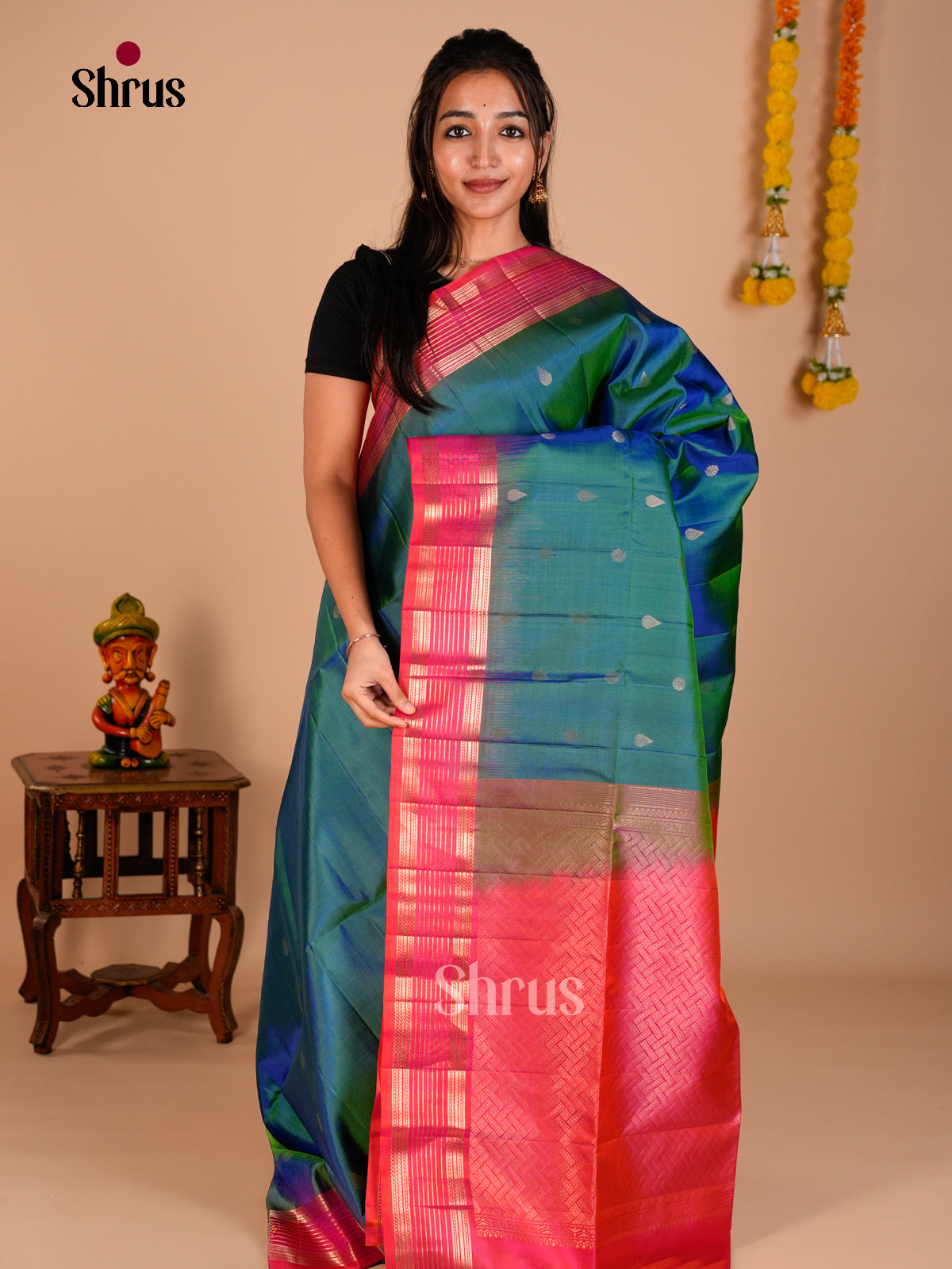 Buy Regal Peacock Green Soft Silk Saree with Floral Buttas & Orangish Pink Zari Brocade Pallu