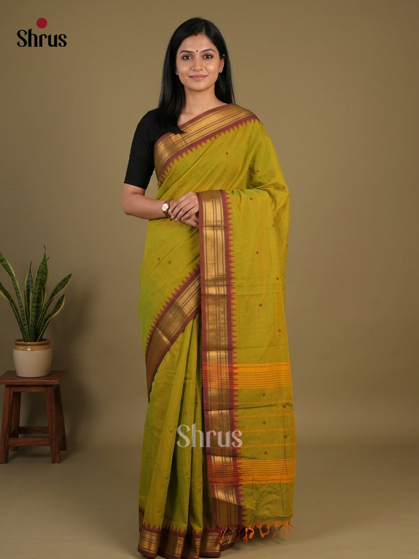 Pretty Mustard Green Chettinad Cotton Saree With Thread Buttas & Brown Temple Zari Border