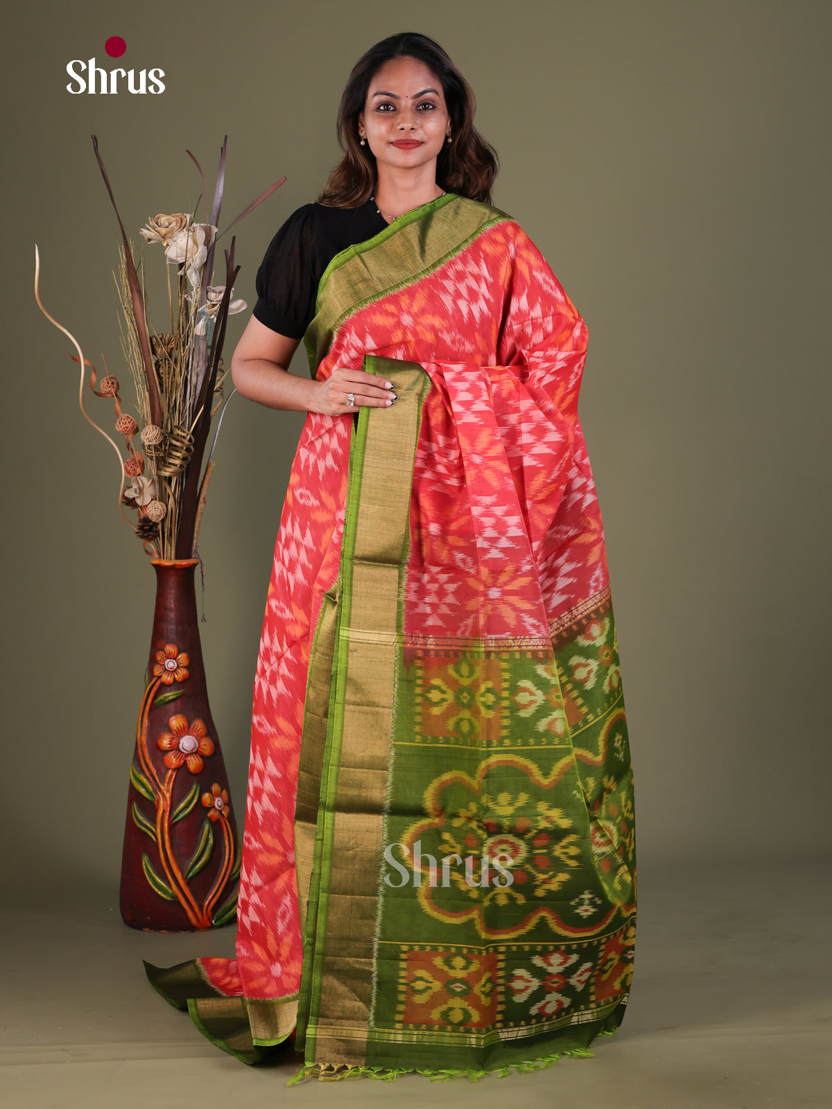 Pretty Orange Pochampally Silk Cotton Saree With Floral Ikat Prints & Olive Green Zari Border