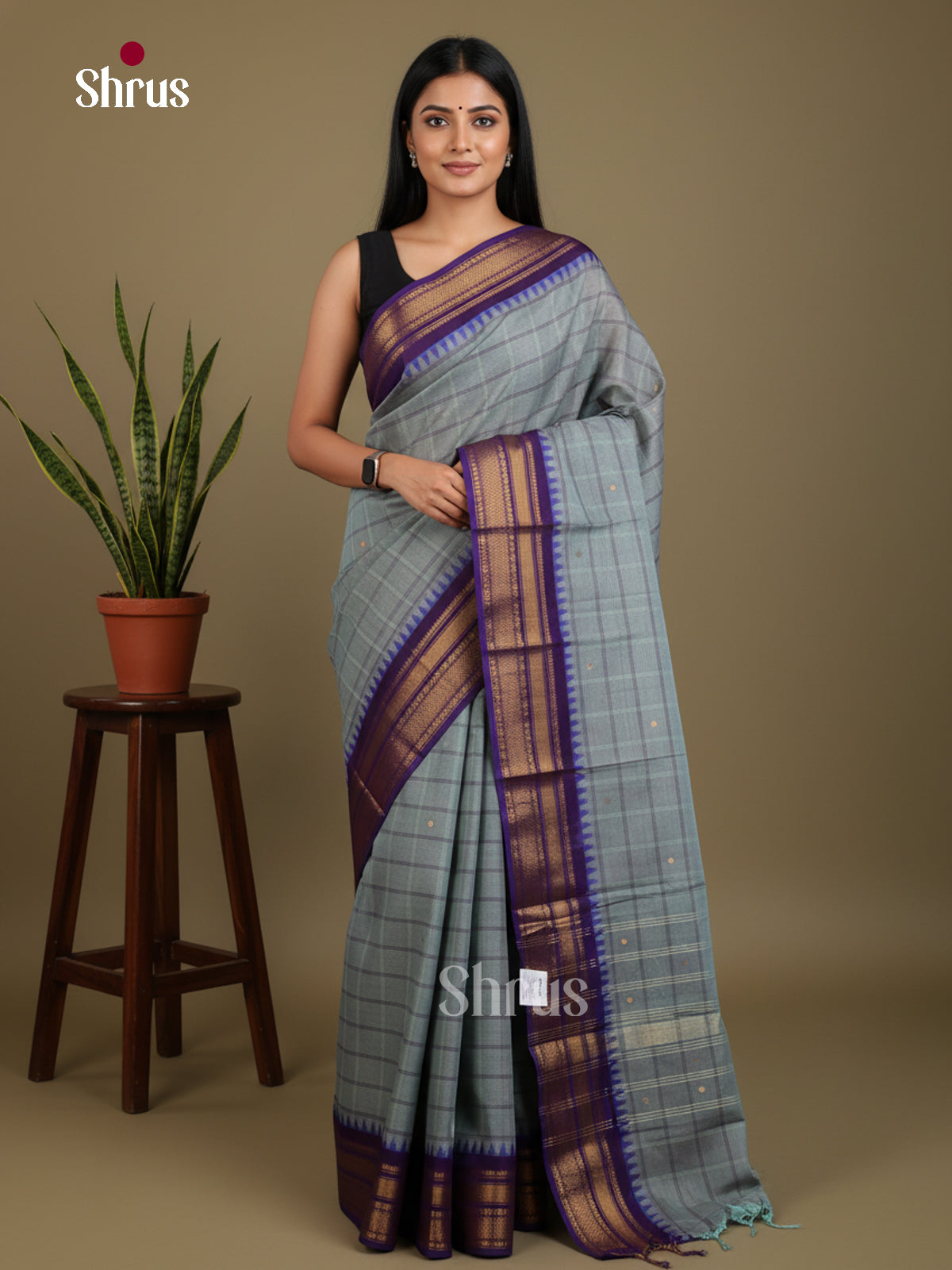 Pretty Pastel Blue Chettinad Cotton Saree With Checks & Navy Zari Temple Border