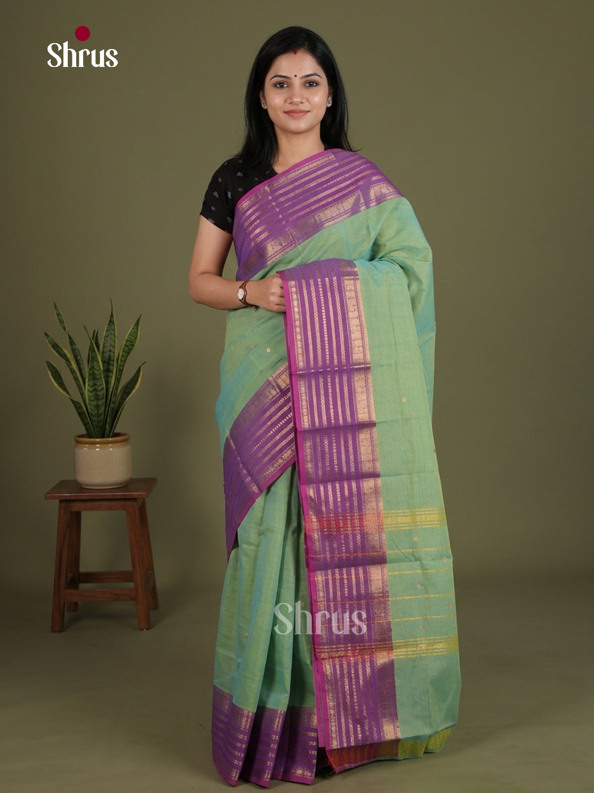 Pretty Pastel Green Chettinad Cotton Saree With Small Buttas & Purple Zari Striped Border