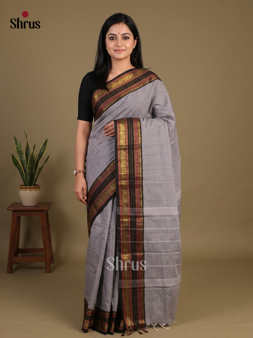 Regal Grey Chettinad Cotton Saree With Plain Body & Black Rettapet Zari Border