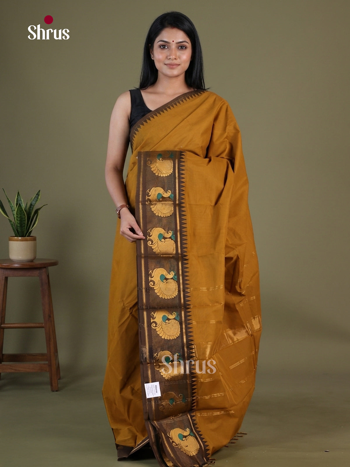 Regal Mustard Chettinad Cotton Saree With Plain Body & Dark Brown Temple Zari Border