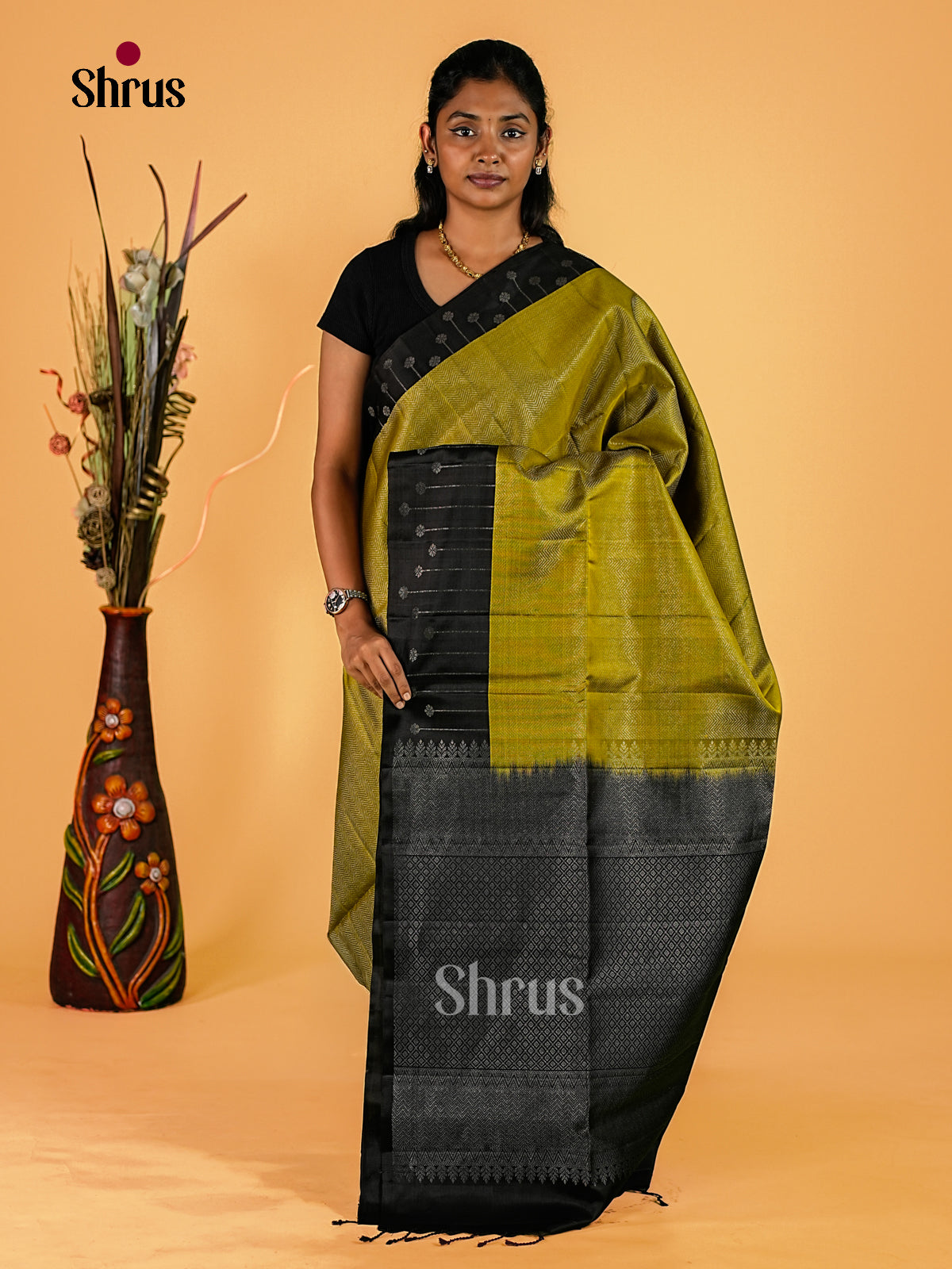 Rich Olive Green Soft Silk Sarees with Subtle Chevron Woven Textured Body, Black Border & Silver Brocade Pallu