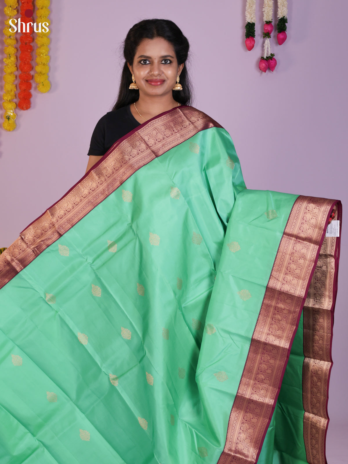 Buy Brilliant Sea Green Kanchipuram Sarees With Floral Buttas, Maroon Zari Border & Brocade Pallu