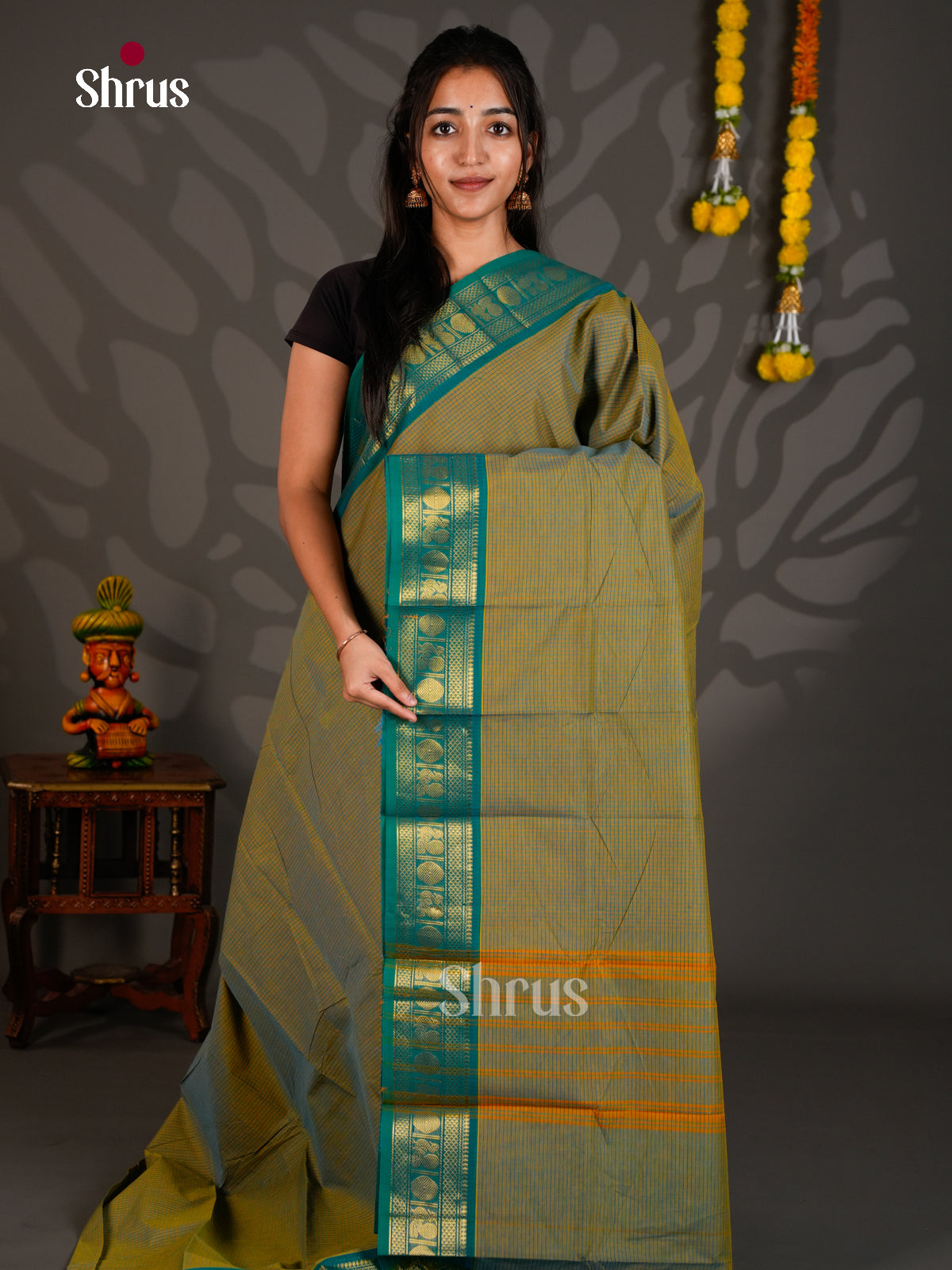 Striking Olive Green Chettinad Cotton Saree With Intricate Stripes & Teal Zari Border 