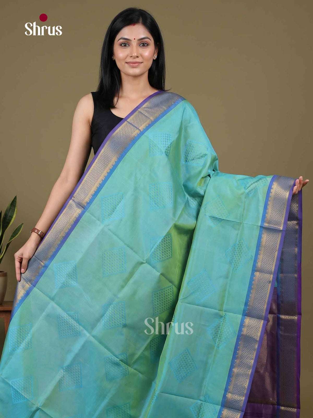 Stunning Sea Green Cotton Silk Saree With Subtle Geometric Motifs & Violet Traditional Zari pallu 1