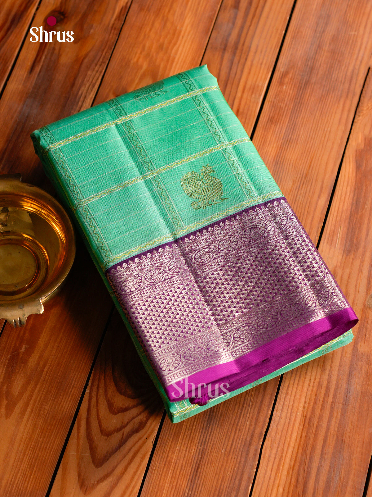 Stunning Sea Green Kanchipuram Silk Saree With Zari Checks & Peacock Buttas | Purple Border & Pallu With Geometric Brocade Pattern