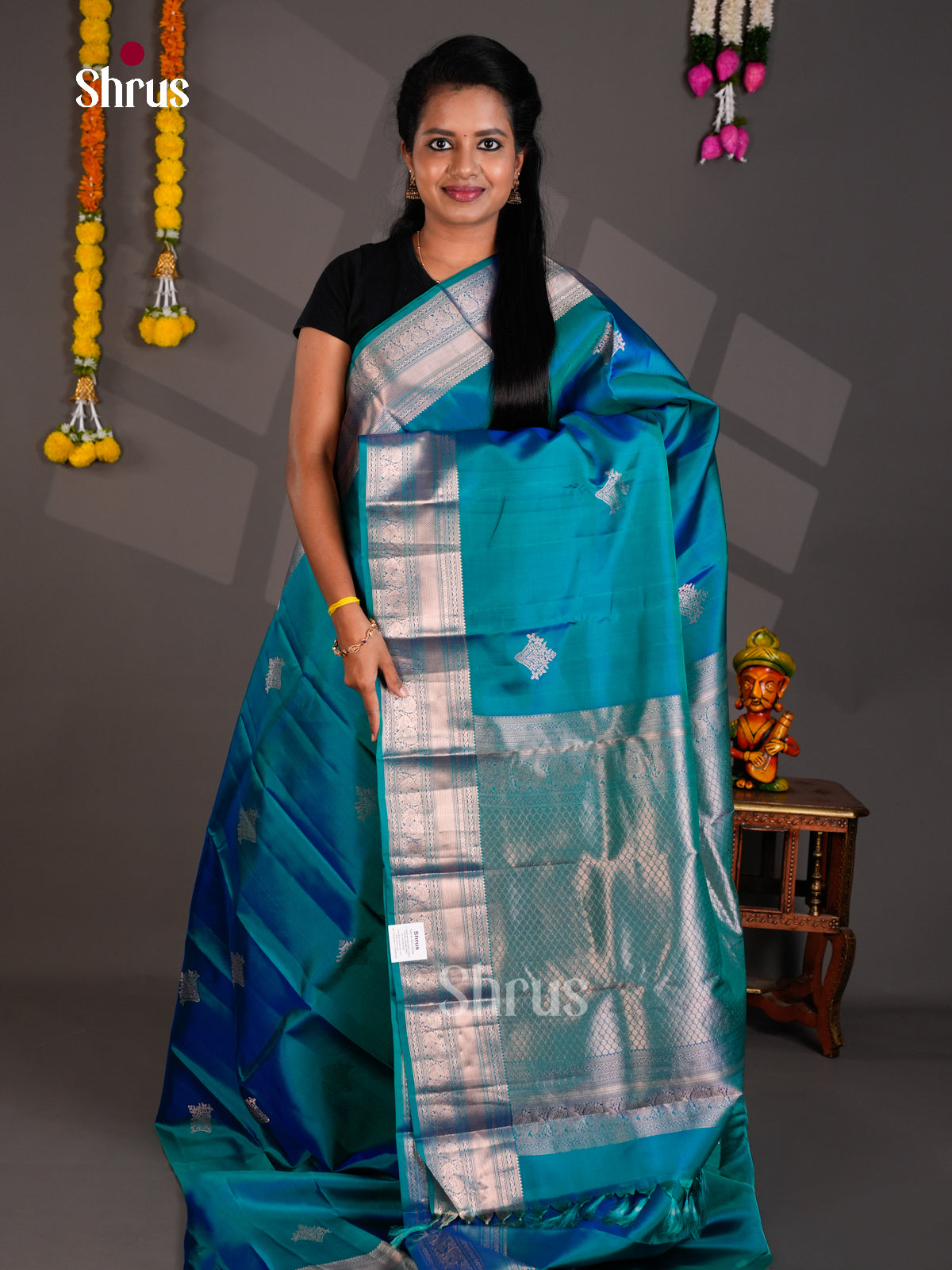 Buy Dazzling Teal Blue Kanchipuram silk Saree With Silver Floral Buttas, Traditional Zari Border & Brocade Pallu