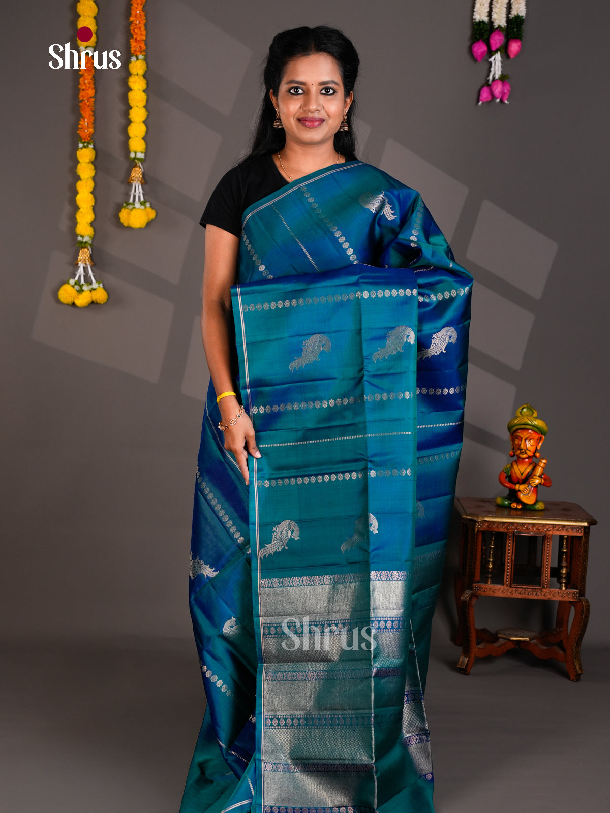 Buy Sheeny Teal Blue Soft Silk Saree With Silver Peacock Motifs, Stripes And Zari Brocade Pallu