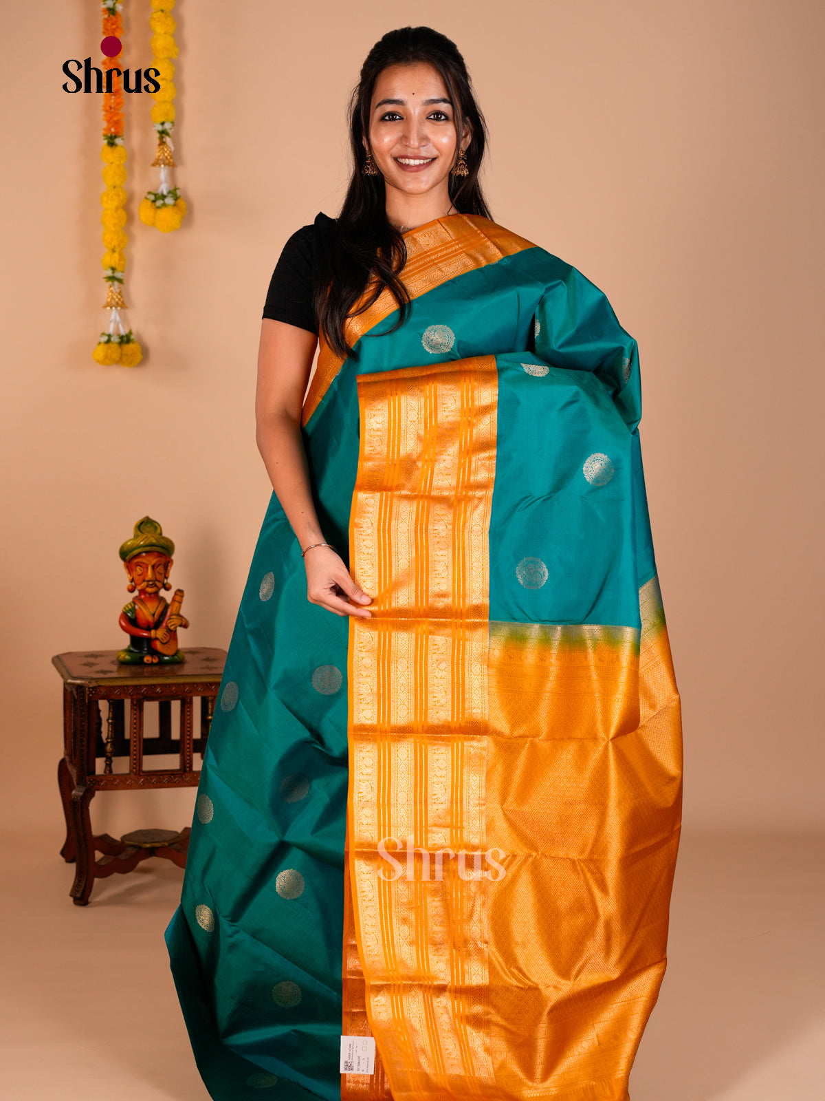 Buy Sheeny Teal Green Kanchipuram Saree With Circular Motifs, Broad Mustard Border & Brocade Pallu