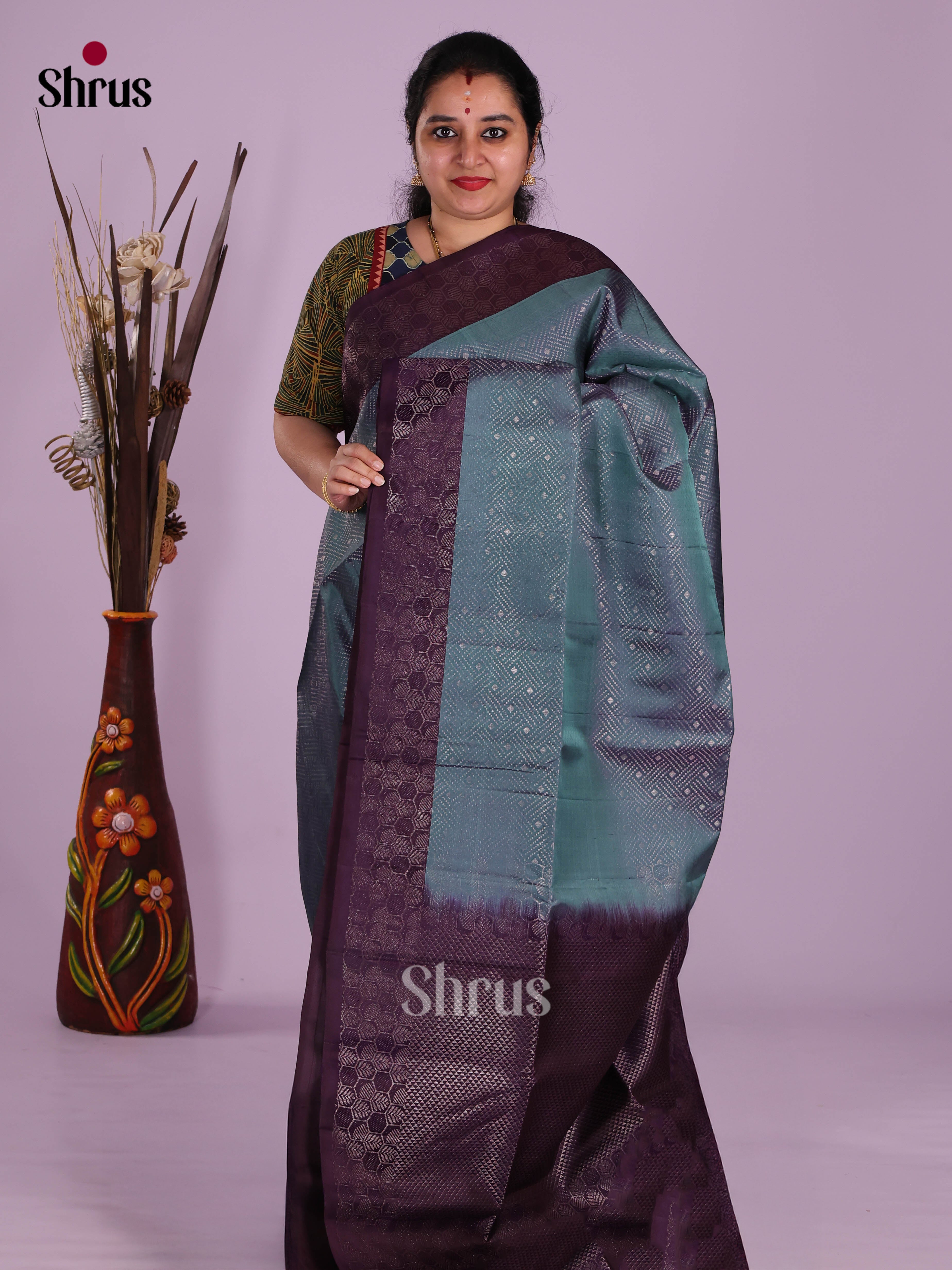 Buy Regal Teal Soft Silk Saree With Intricately Woven Zari Geometric Patterns, Wine Border & Pallu