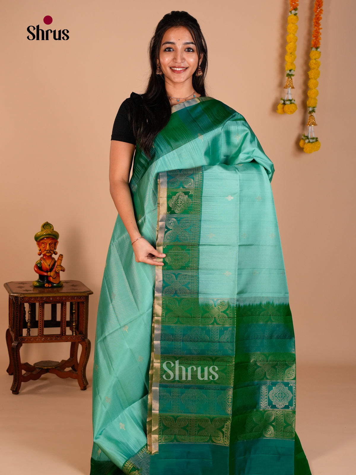 Buy Stunning Teal Soft Silk Saree with Zari Floral Buttas & Green Brocade Weave Border