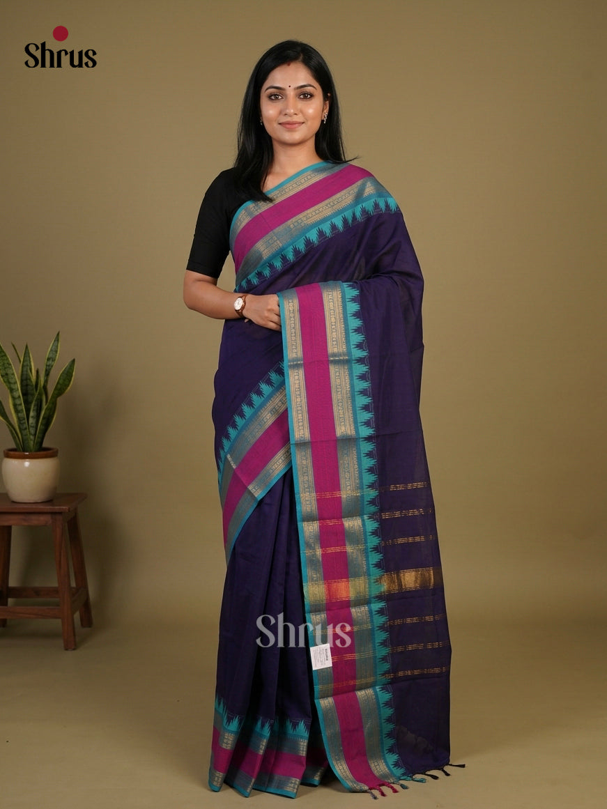 Timeless Dark Blue Chettinad Cotton Saree With Plain Body & Turquoise Rettapet Zari Border