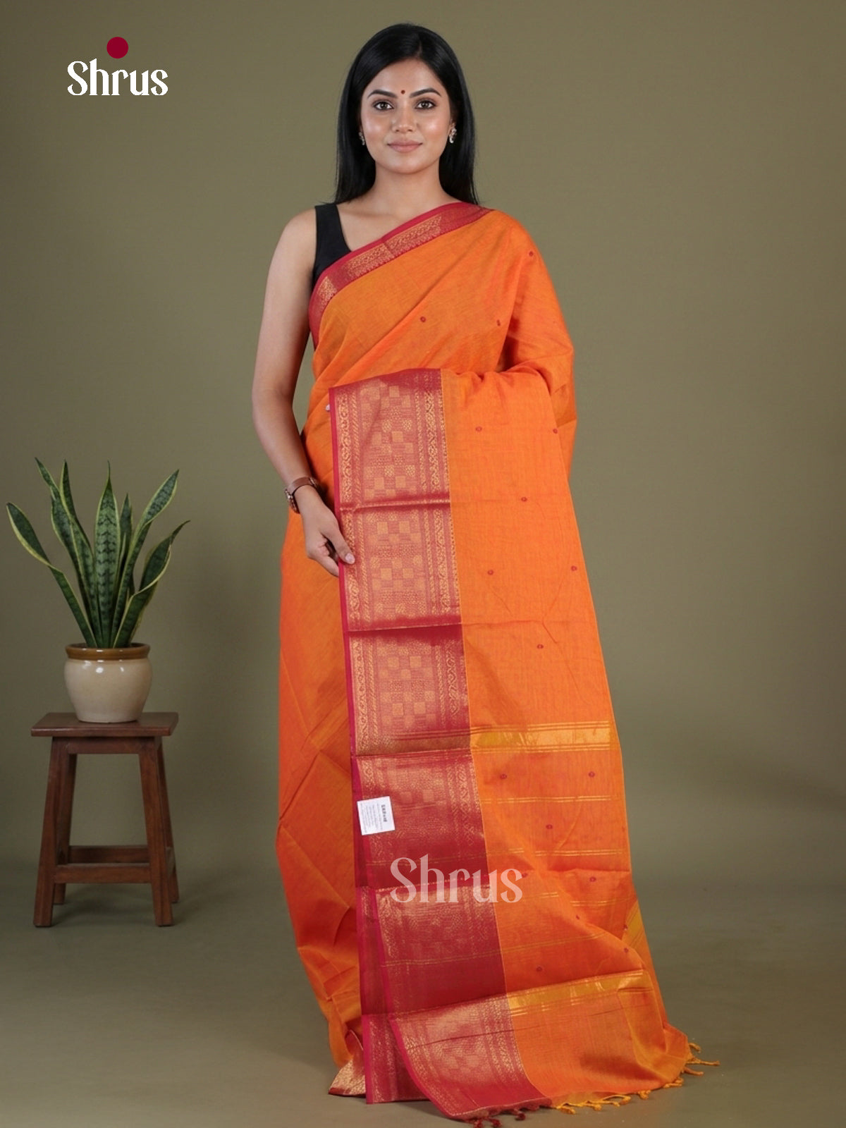 Vivid Orange Chettinad Saree With Thread Buttas & Pink Border With Checks Patterns
