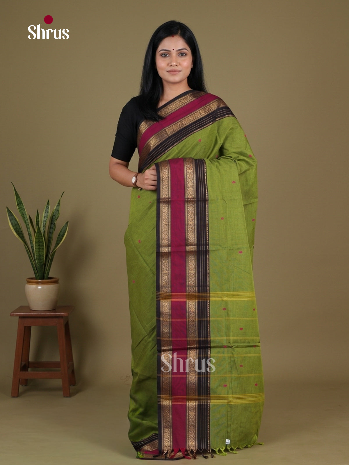 Vivid Parrot Green Chettinad Cotton Saree With Floral Buttas & Black Rettapet Zari Border