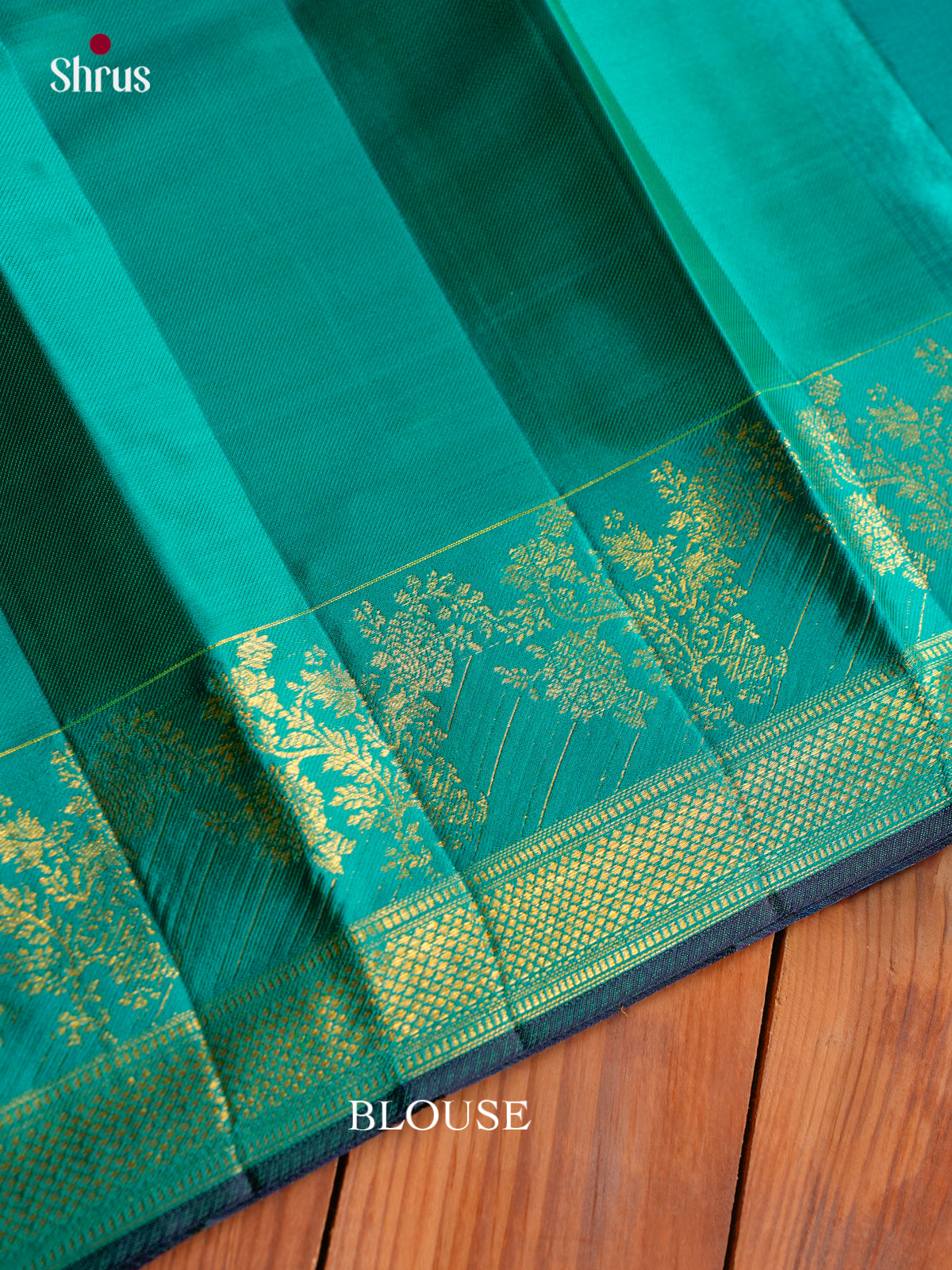 Vivid Sea Green Pattu Saree With Bold Checks & Teal Border With Floral Vines