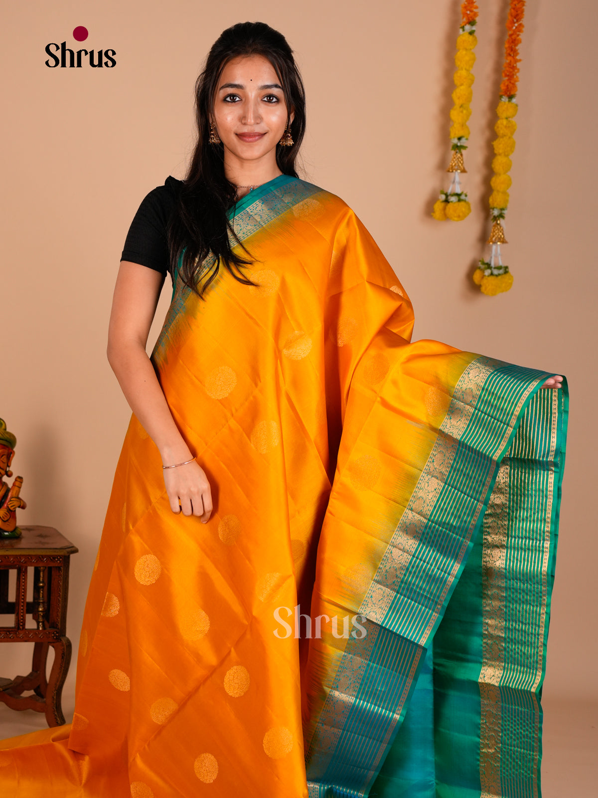 Buy Exquisite Yellow Pure Soft Silk Saree with Gold Circular Motifs & Teal Green Brocade Pallu