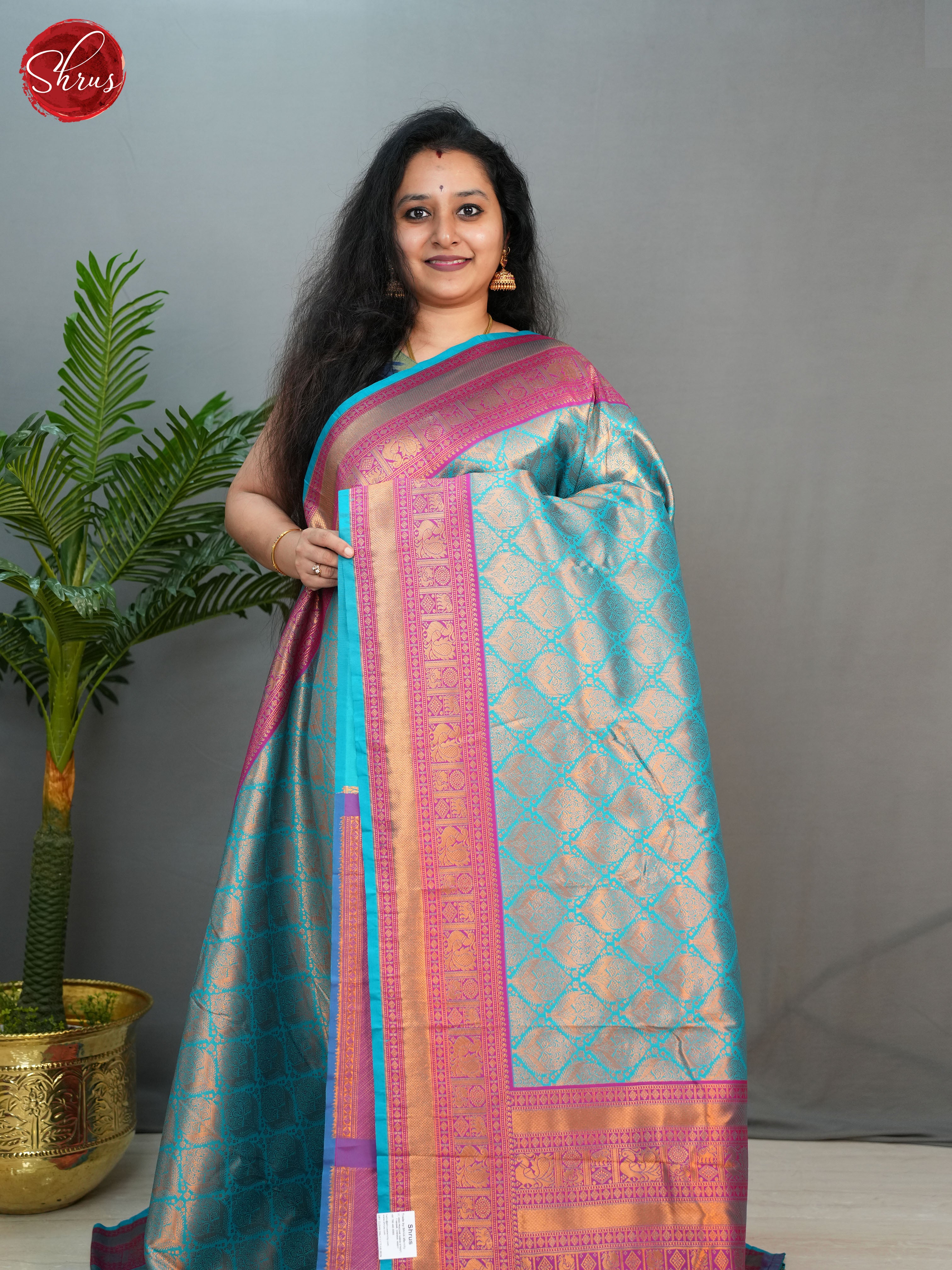 Blue & Purple -Semi Kanchipuram with Zari woven floral motifs  on the body & Contrast Zari Border - Shop on ShrusEternity.com