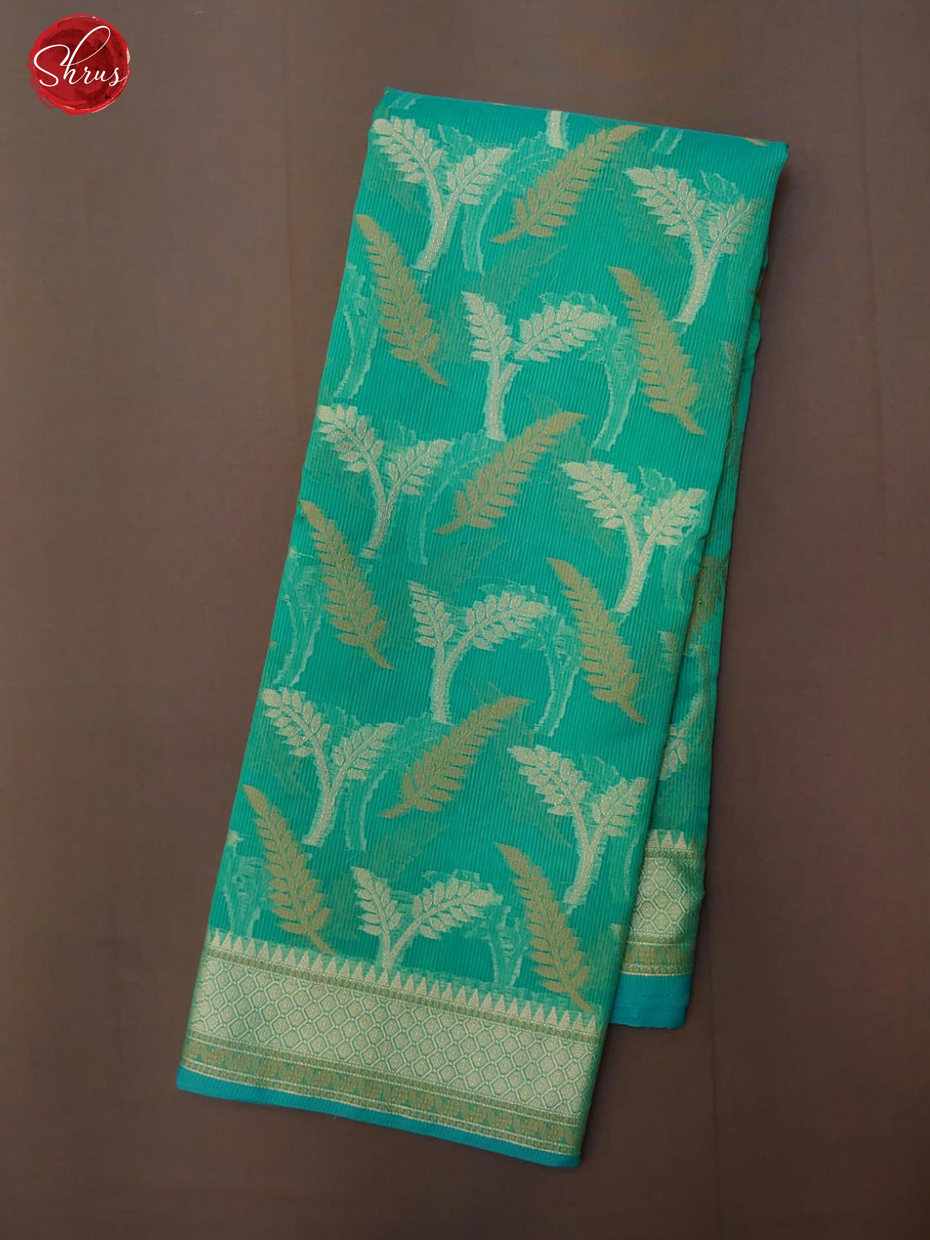 Green(Single Tone)- Banarasi Silk Cotton with zari woven floral brocade on the body& Zari Border - Shop on ShrusEternity.com