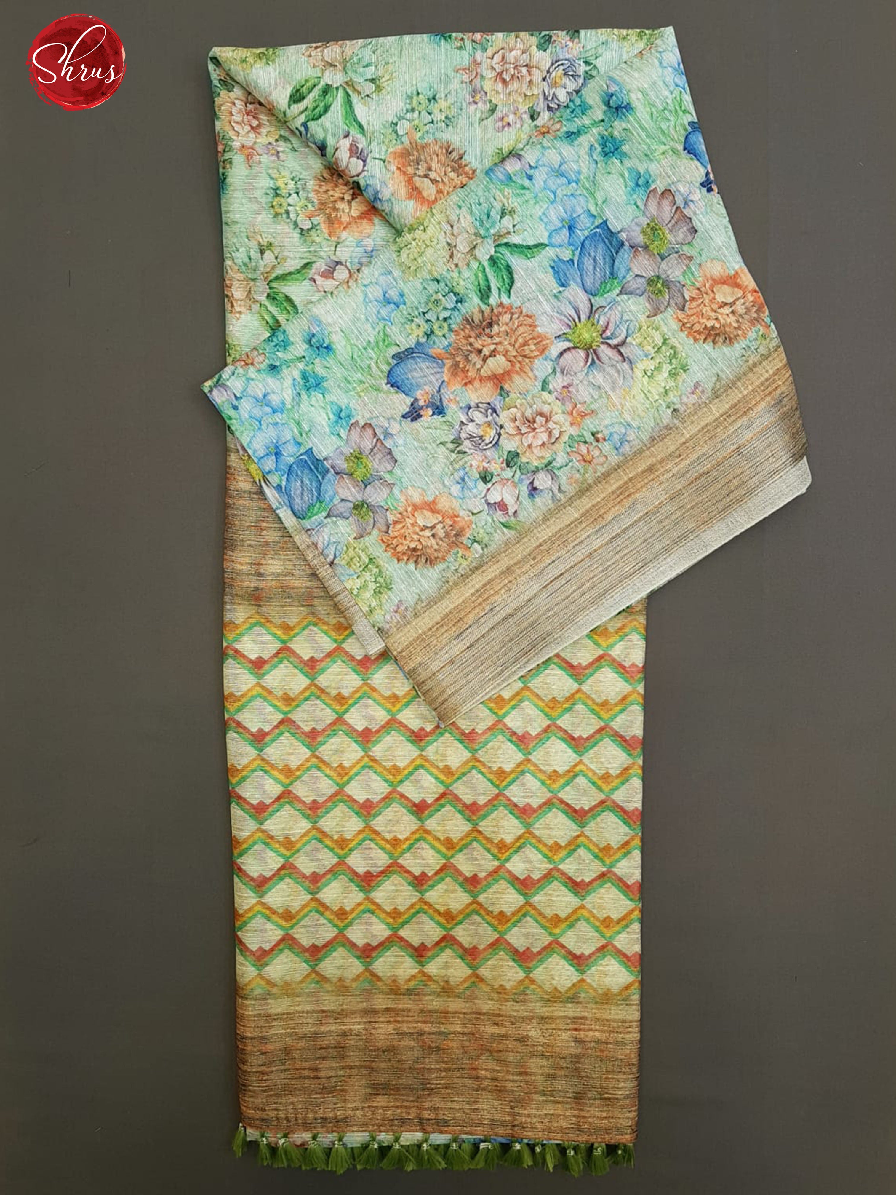 Green & Brown- Semi Jute with floral print on the body & Zari Border - Shop on ShrusEternity.com