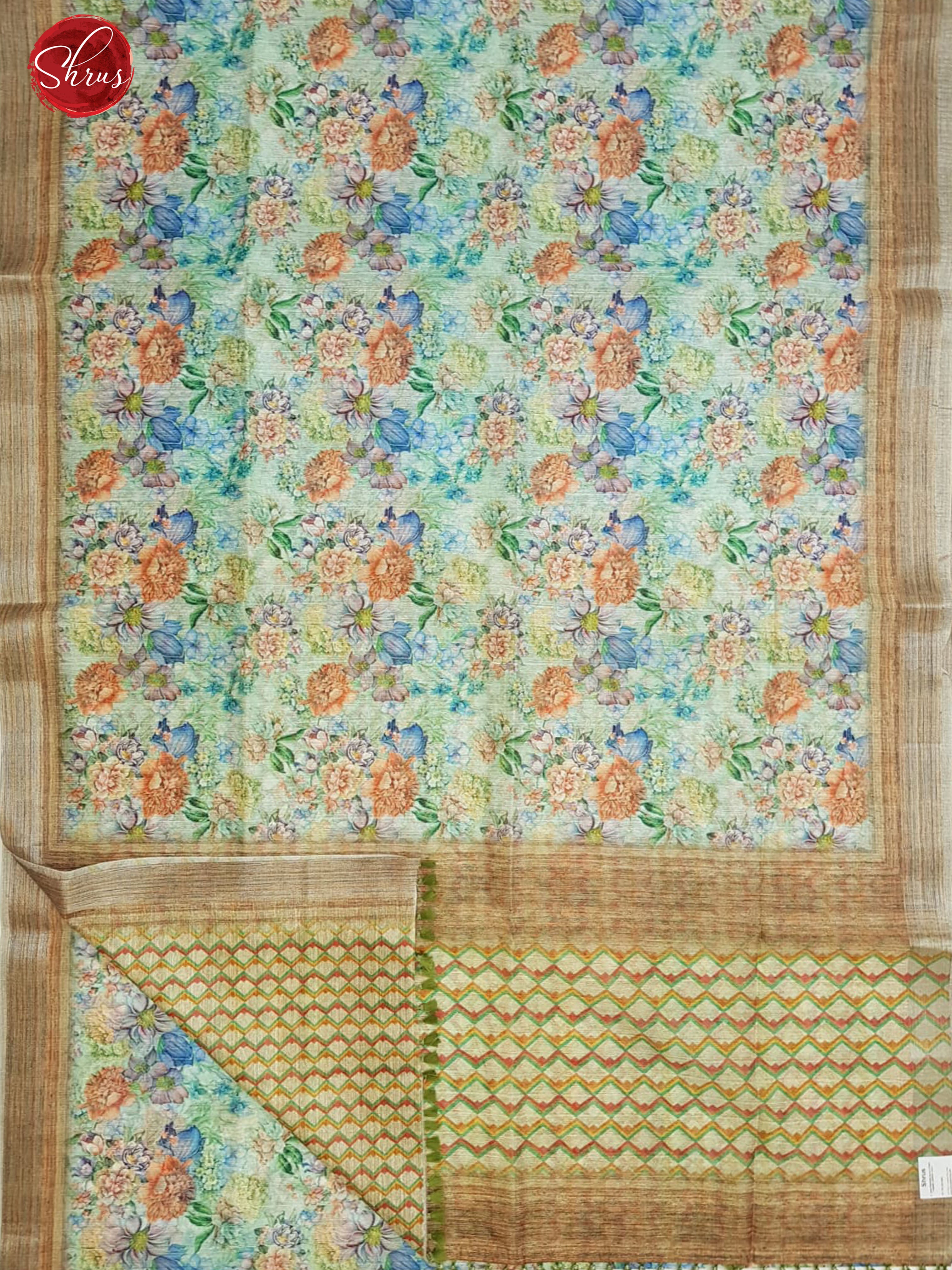 Green & Brown- Semi Jute with floral print on the body & Zari Border - Shop on ShrusEternity.com