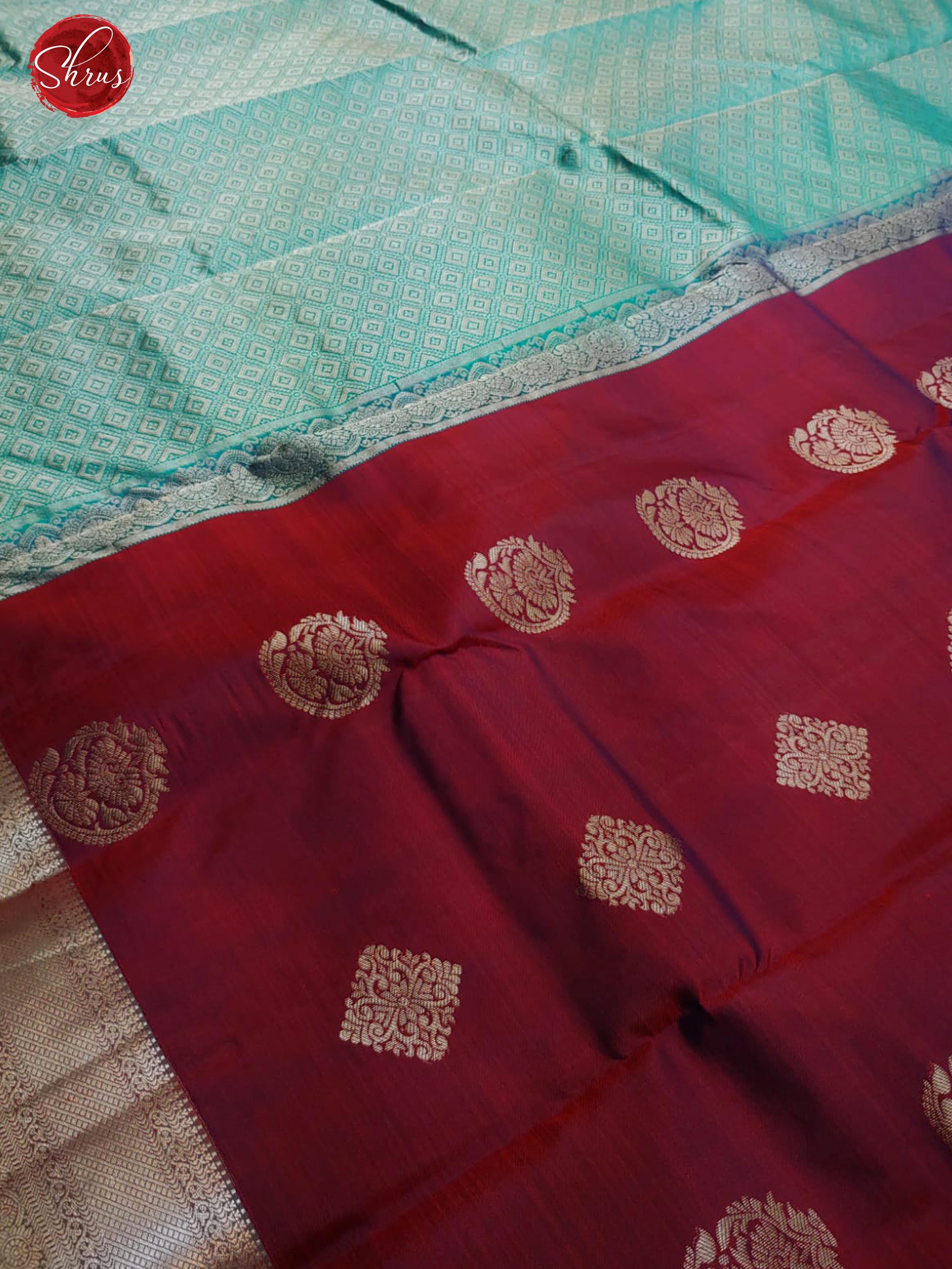 Maroon & Teal - Kanchipuram Silk with zari woven floral motifs on the body& Zari Border - Shop on ShrusEternity.com
