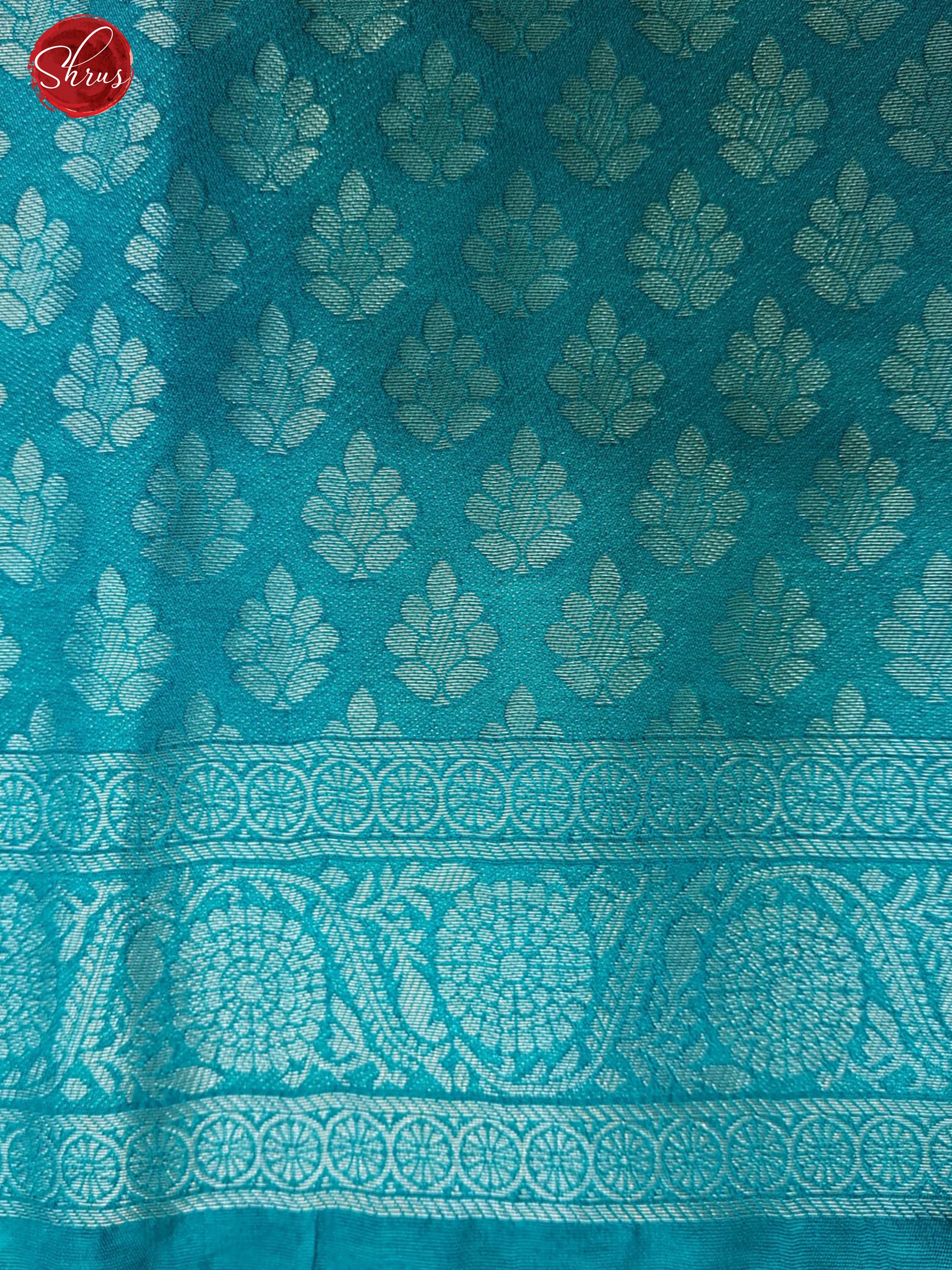 Grey & Teal Blue- Semi Georgette with floral print on  the body & Contrast Zari Border - Shop on ShrusEternity.com