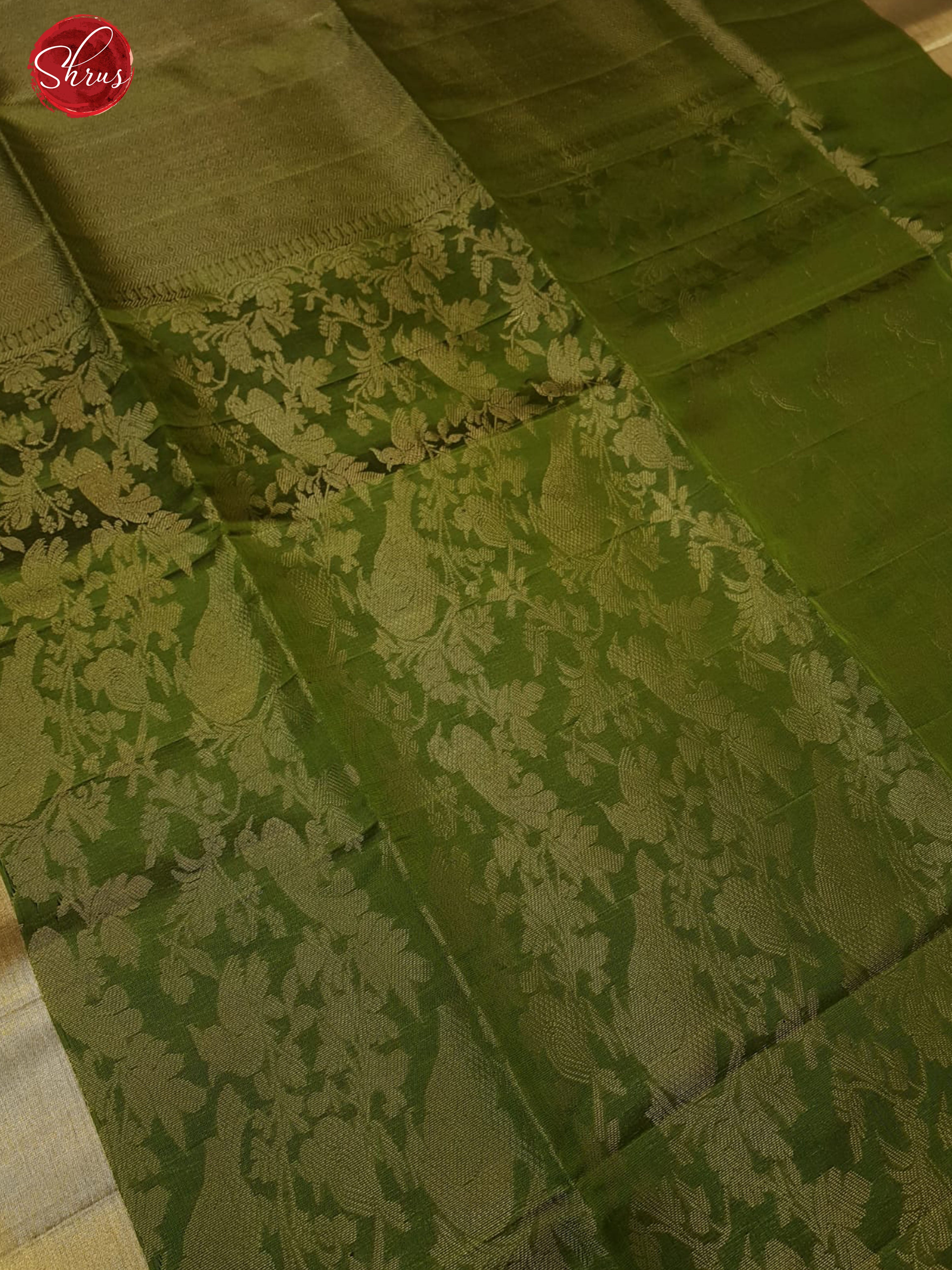 Green(Single Tone)- Soft Silk with zari woven floral nestling brocade on the body & Zari Border - Shop on ShrusEternity.com