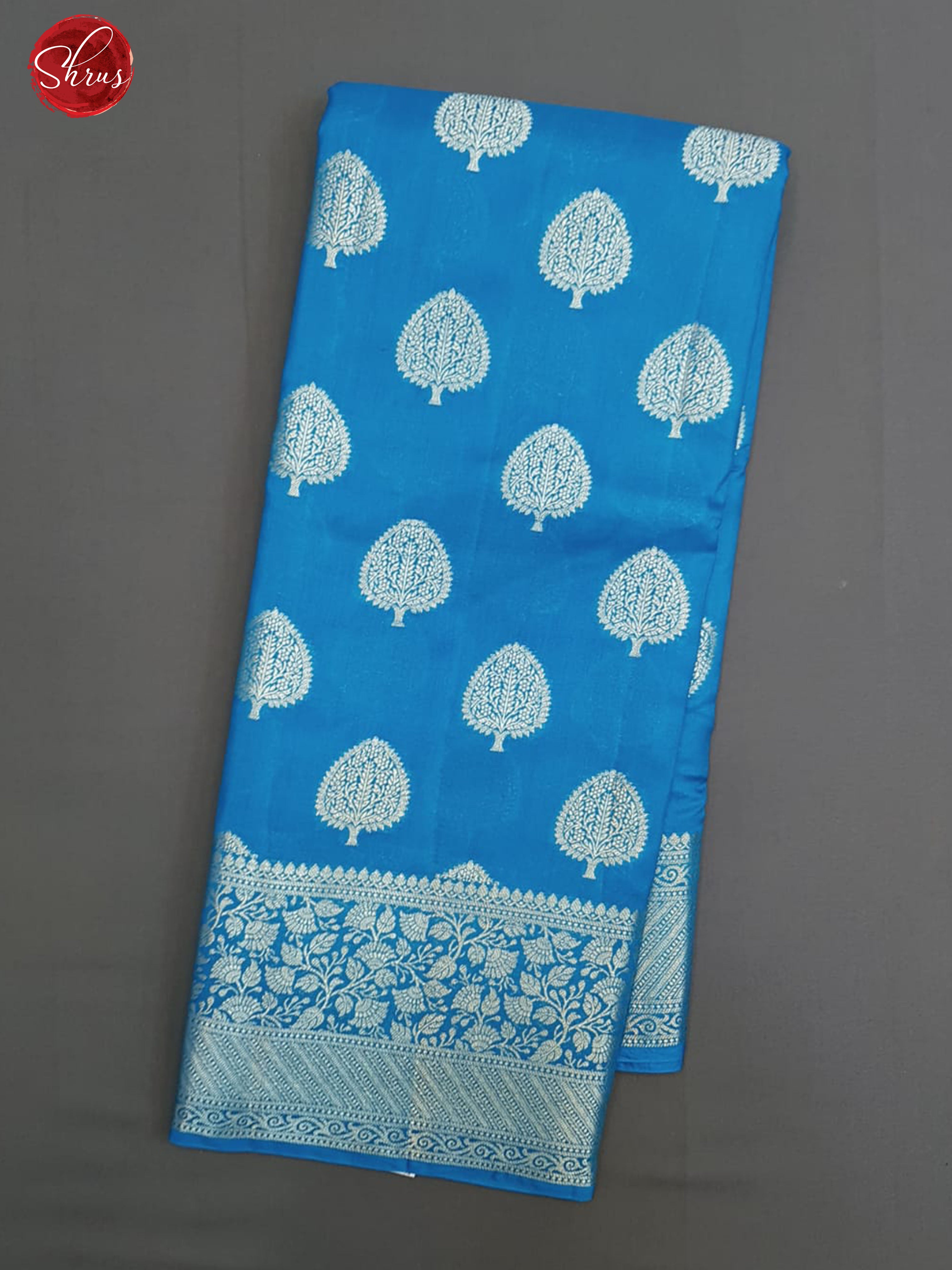 Blue(Single Tone)- Tussar with zari woven floral motifs on the body & Zari Border - Shop on ShrusEternity.com