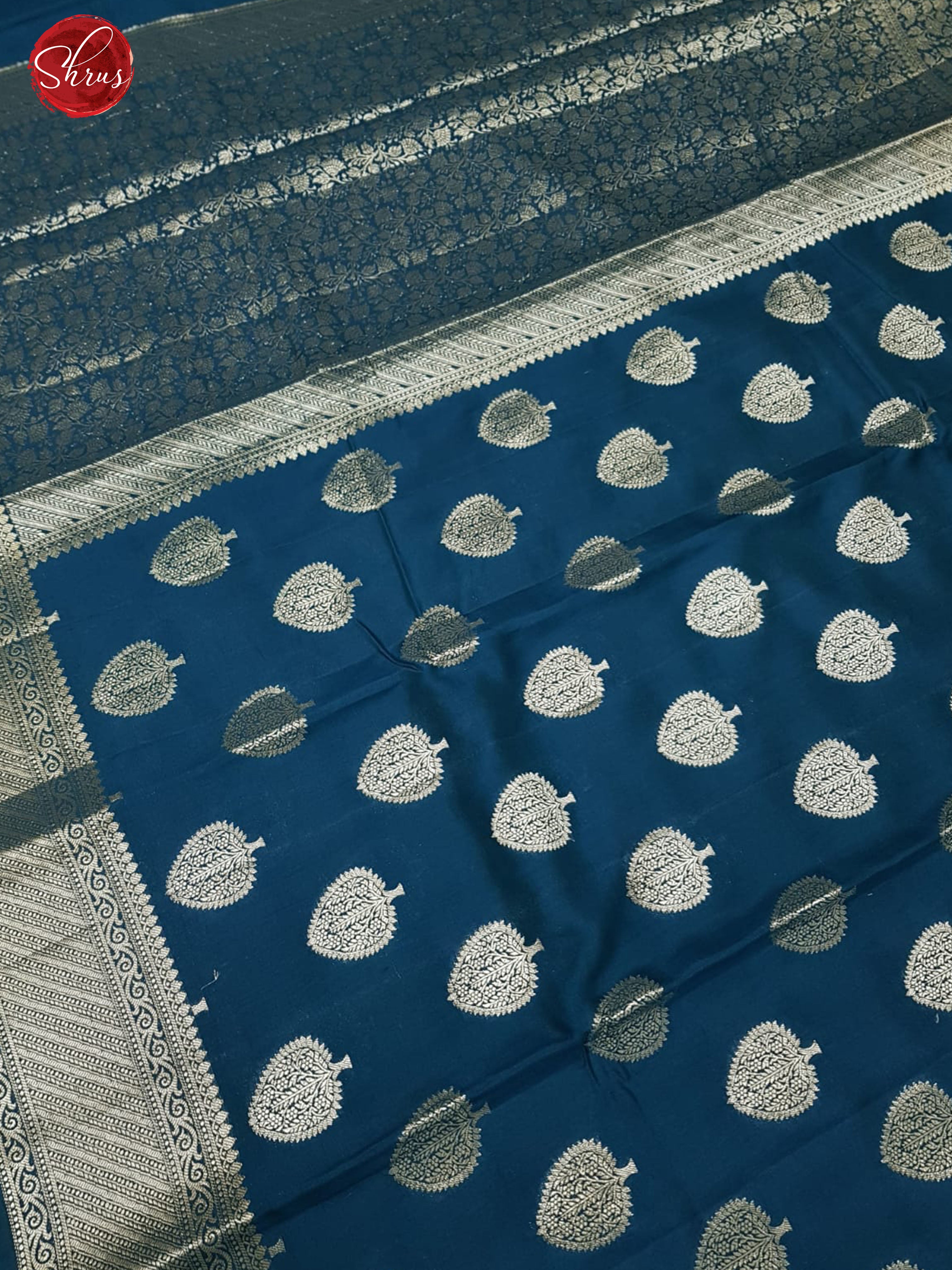 Blue(Single Tone)- Tussar with zari woven floral motifs on the body &Zari Border - Shop on ShrusEternity.com