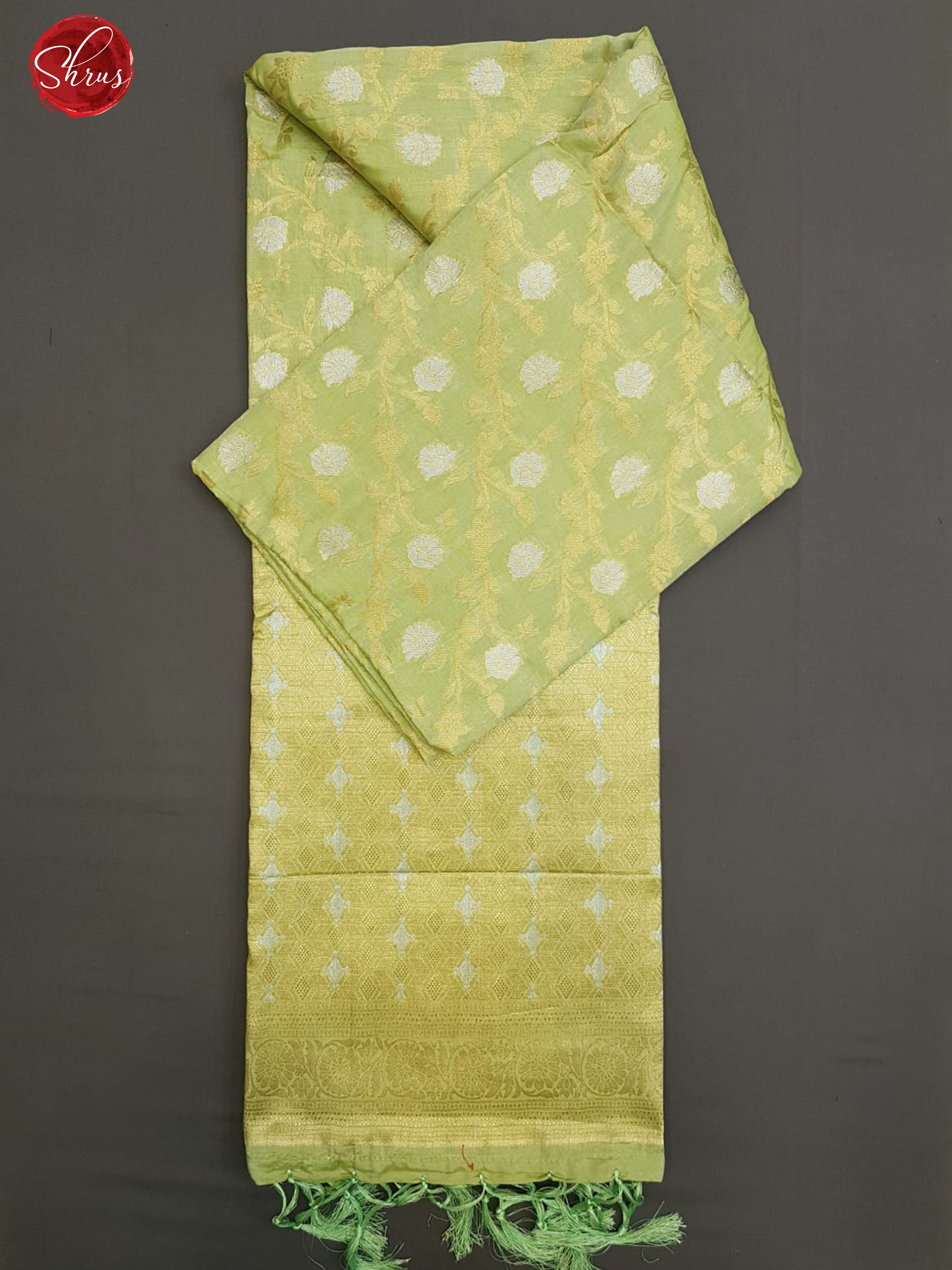 Green(SIngle Tone)- Semi Banarasi with zari woven floral nestling brocade on the body& zari border - Shop on ShrusEternity.com