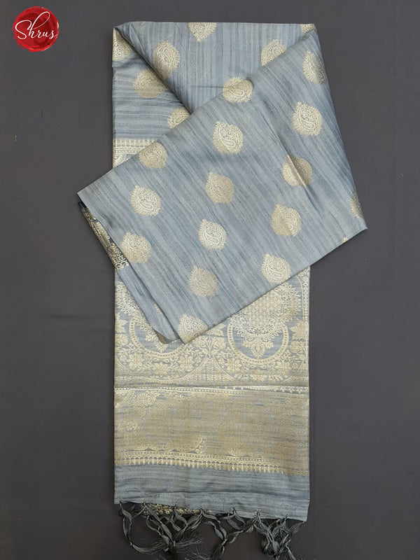 Grey(Single Tone)- Semi Banarasi with zari woven floral motifs on the body& Zari Border - Shop on ShrusEternity.com
