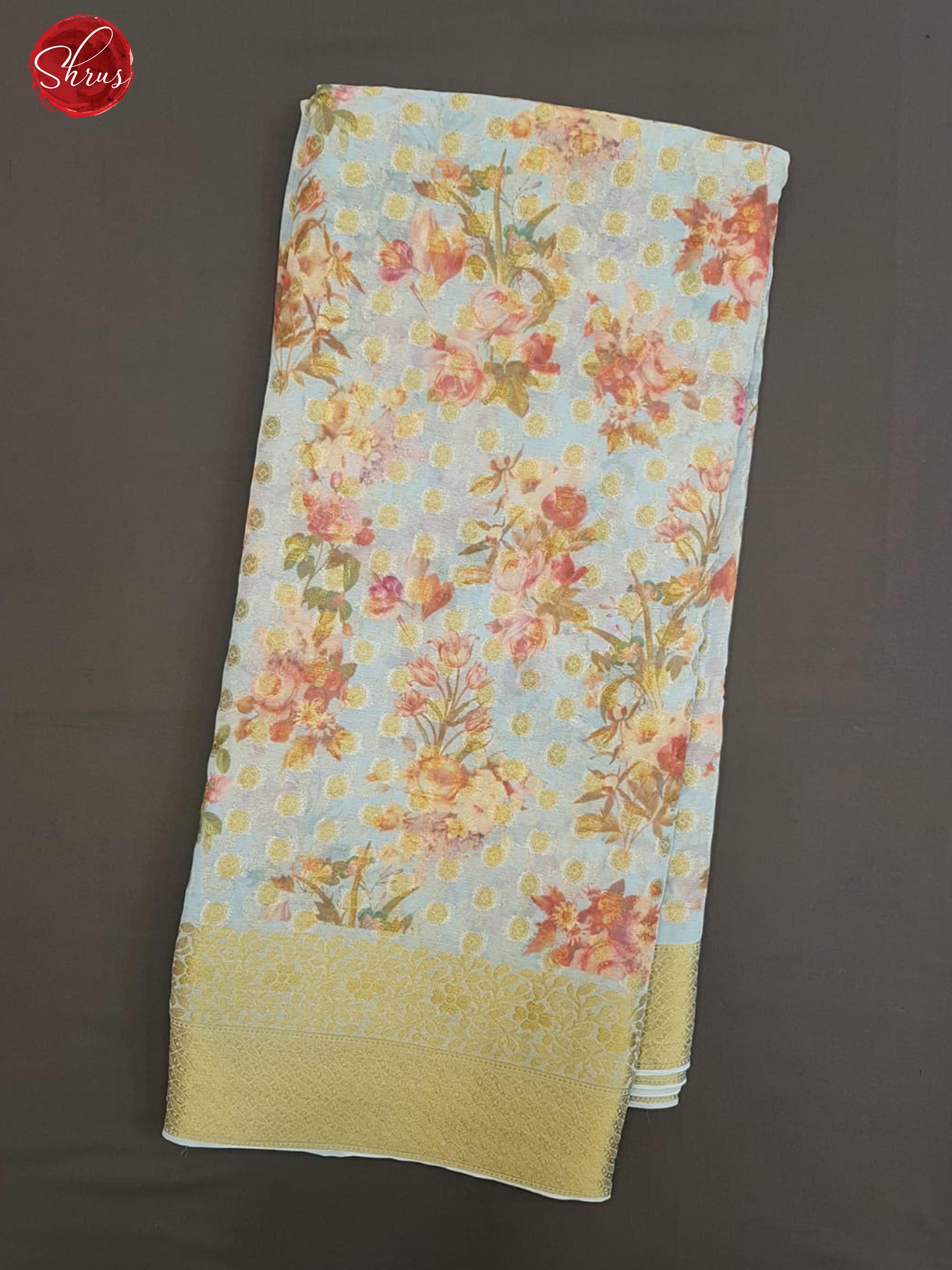 Blue(Single tone)- Semi Chiffon with zari floral buttas, floral print  on the body & Zari Border - Shop on ShrusEternity.com