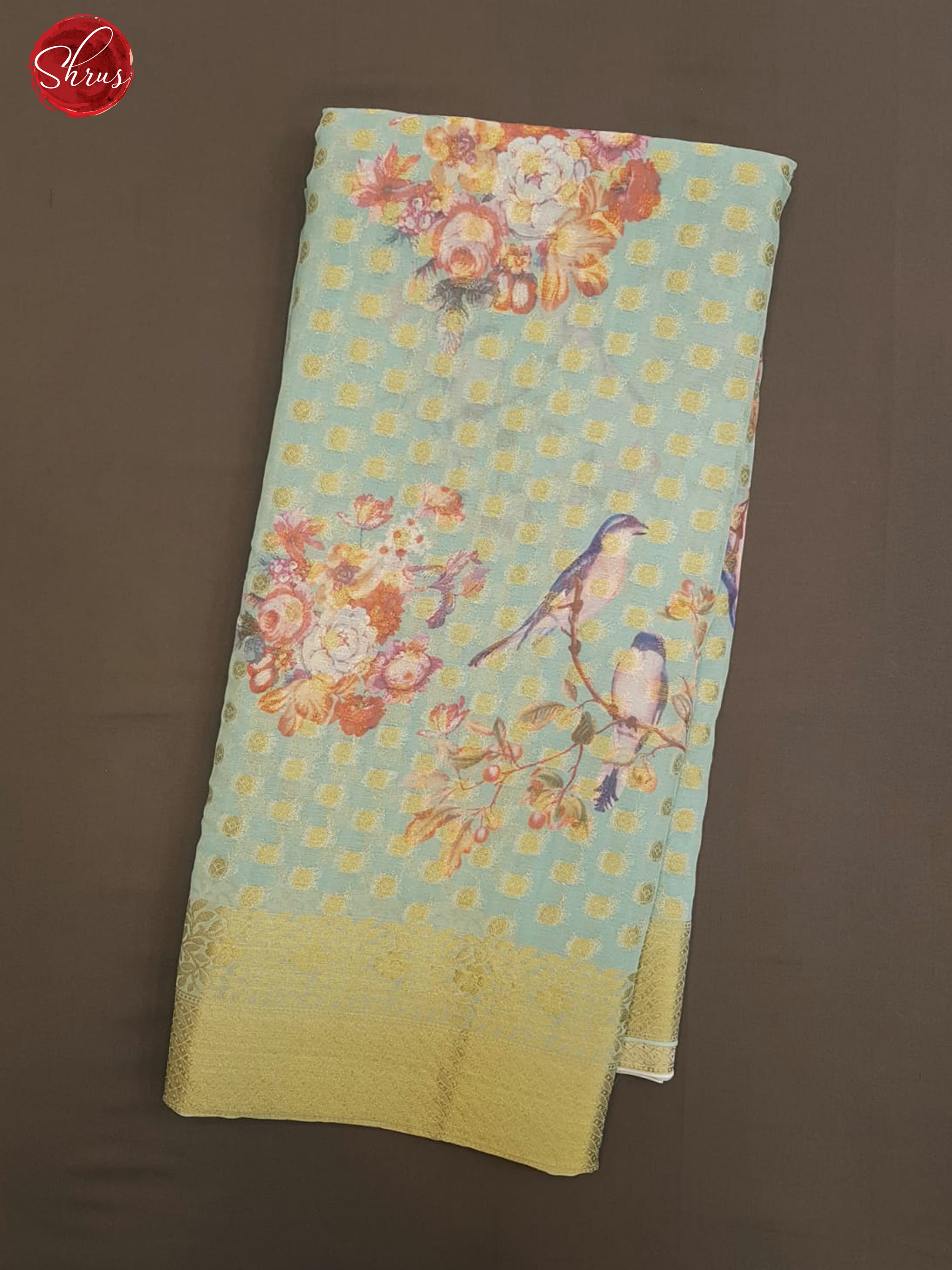 Blue(Single tone)- Semi Chiffon with zari floral buttas ,  floral print  on the body & Zari Border - Shop on ShrusEternity.com