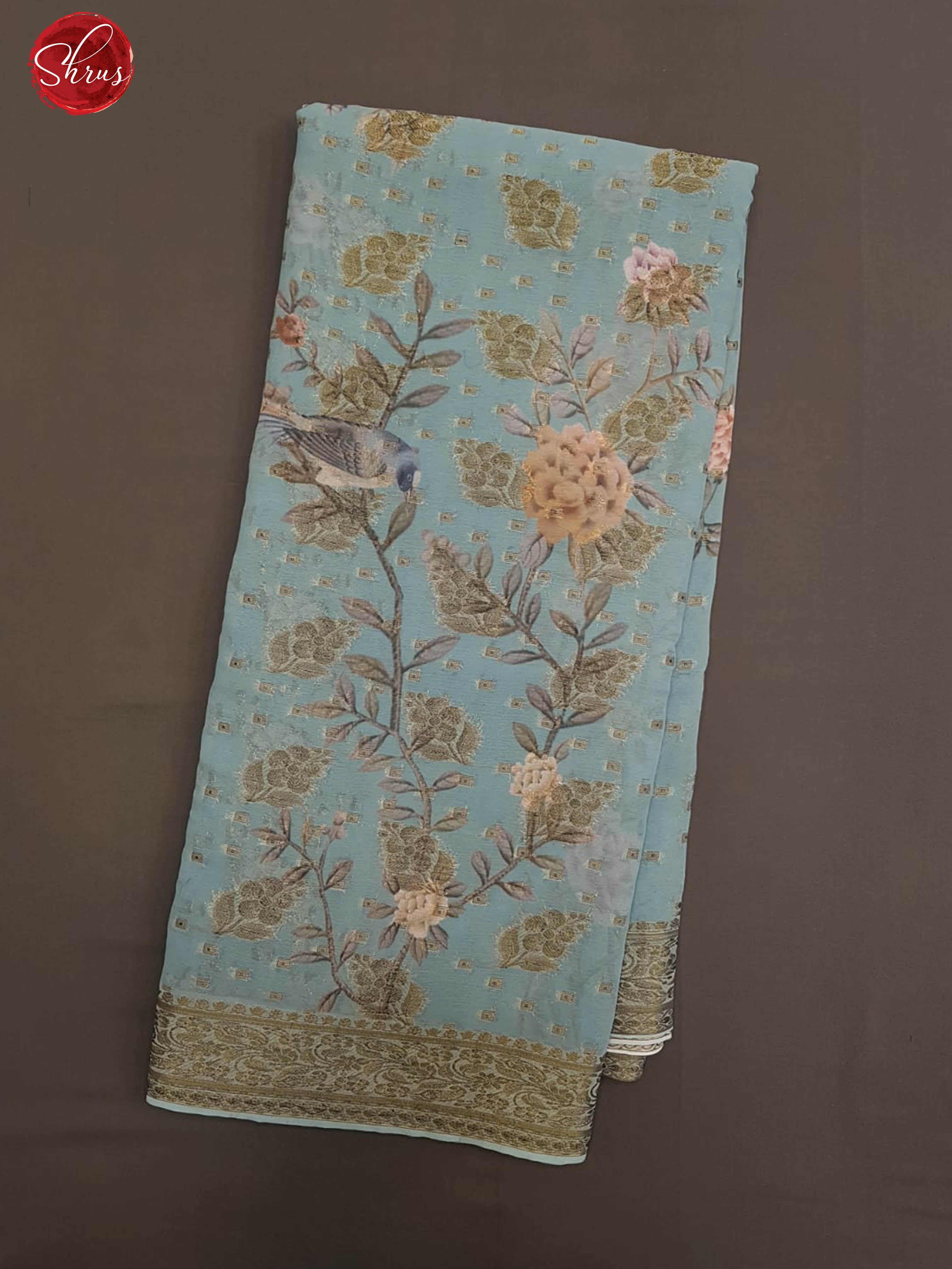 Blue(Single Tone)- Semi Chiffon with floral print ,  zari Buttas on the body & Zari Border - Shop on ShrusEternity.com
