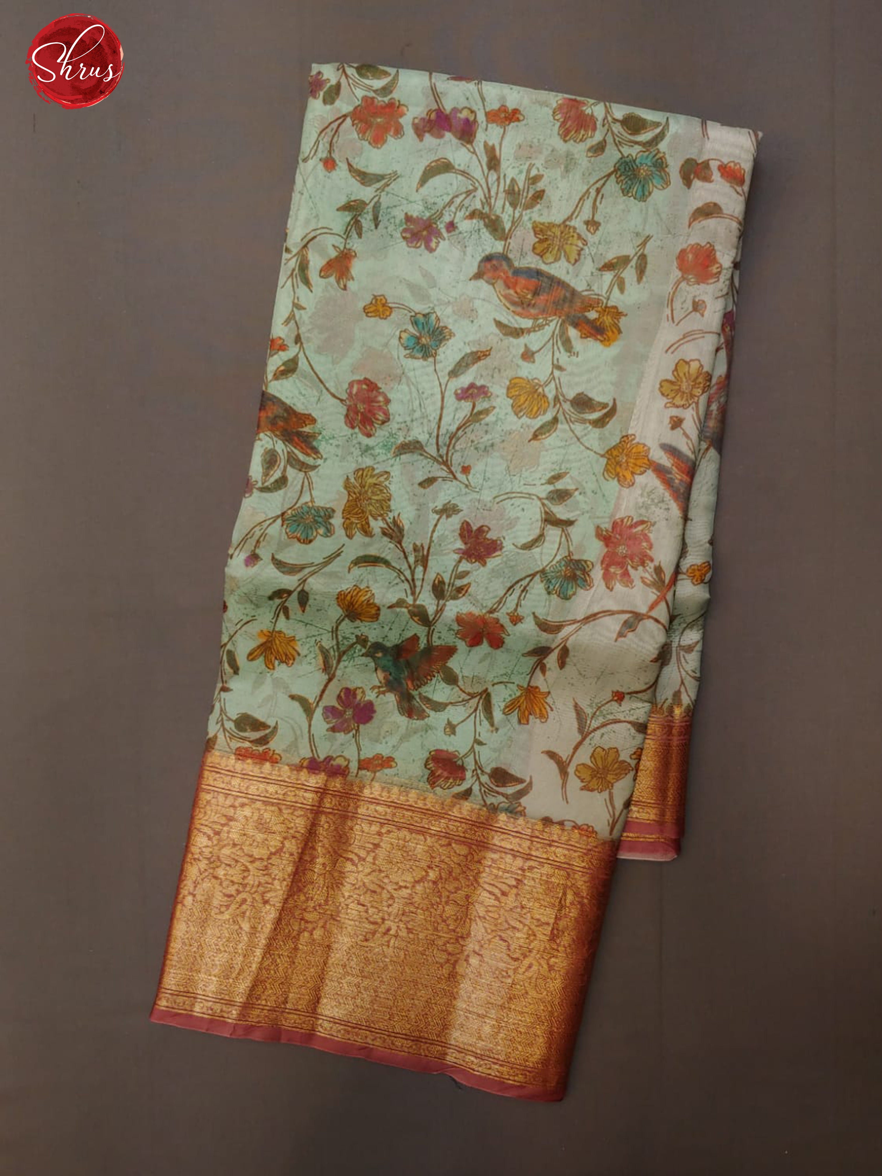 Green & Orange - Organza with floral print on the body and zari border - Shop on ShrusEternity.com