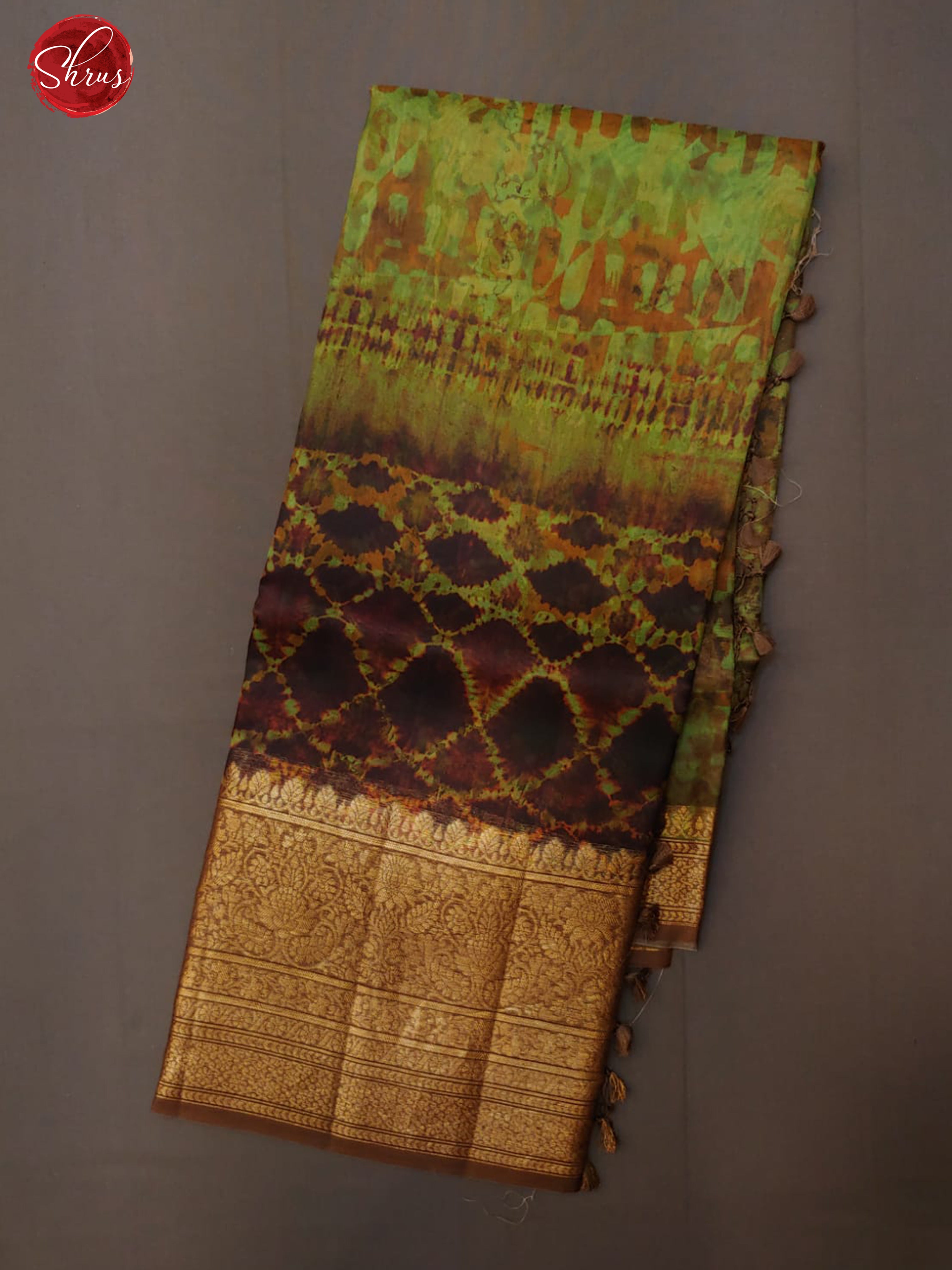 Green & Brown - Organza with floral pattern on the body and zari border - Shop on ShrusEternity.com