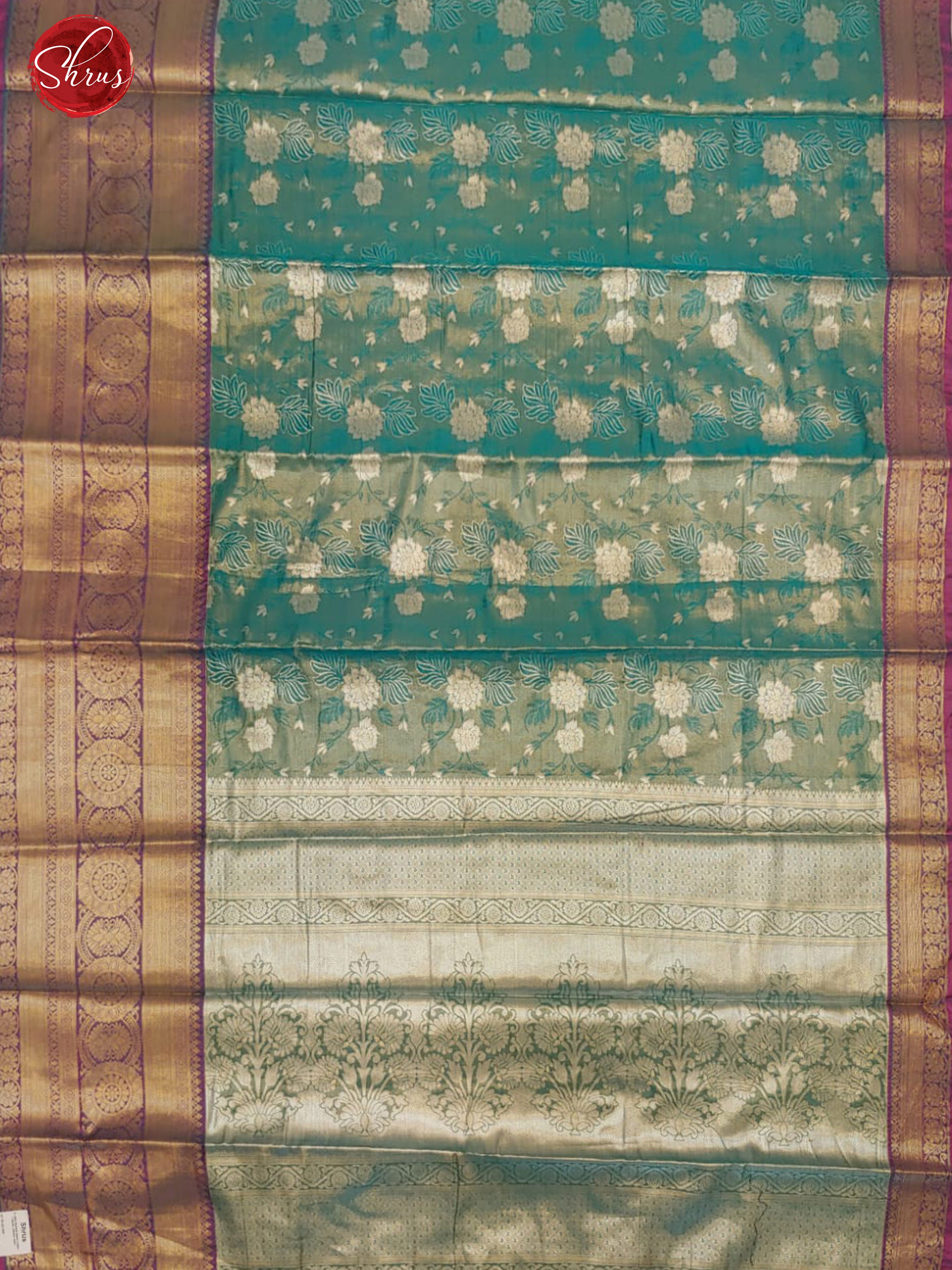 Teal Green & Purple-Tissue Banarasi with zari brocade on the body and zari border - Shop on ShrusEternity.com