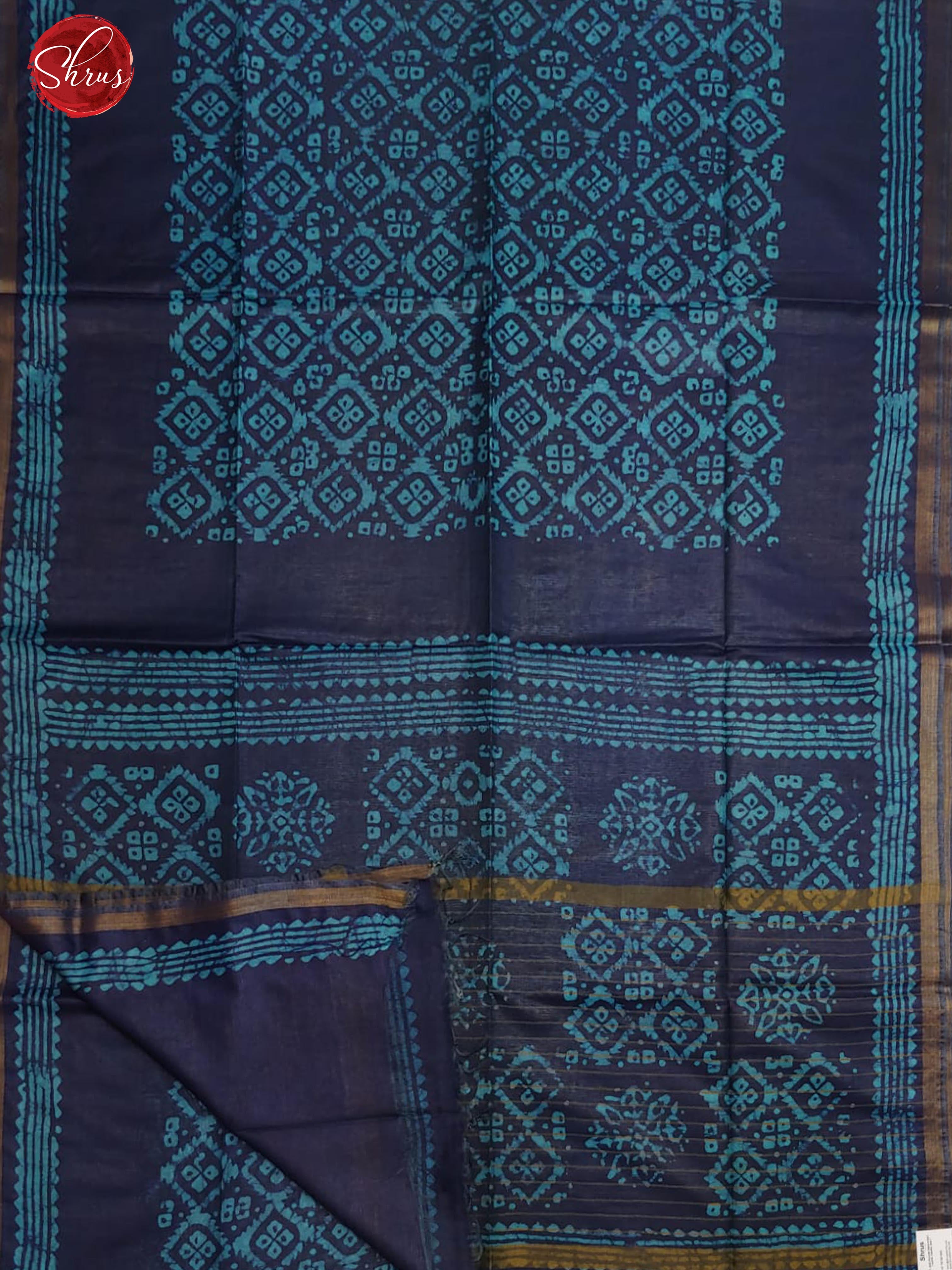 Blue (Single Tone)- Bhatik  with floral pattern on the body &  zari   Border - Shop on ShrusEternity.com